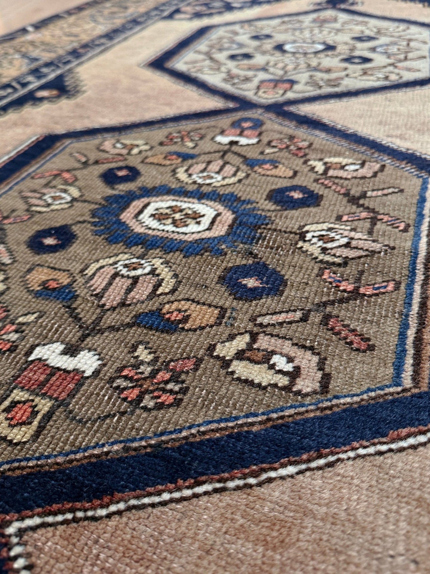 4x8 Vintage Yahyali Turkish wool rug with hexagonal medallions camel beige navy. Perfect for bedroom, living room, or kitchen. One-of-a-kind rug from Indigo Rugs in Burlingame, the best rug shop in the San Francisco Bay Area. Free shipping