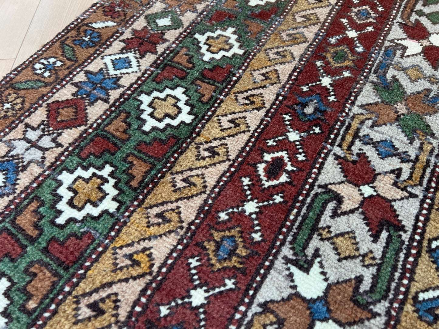 Kars kurdish handmade rug. 6x8 neutral color living room rug shop san francisco bay area. Vintage rug shop palo alto. Handmade rug in living room setting.