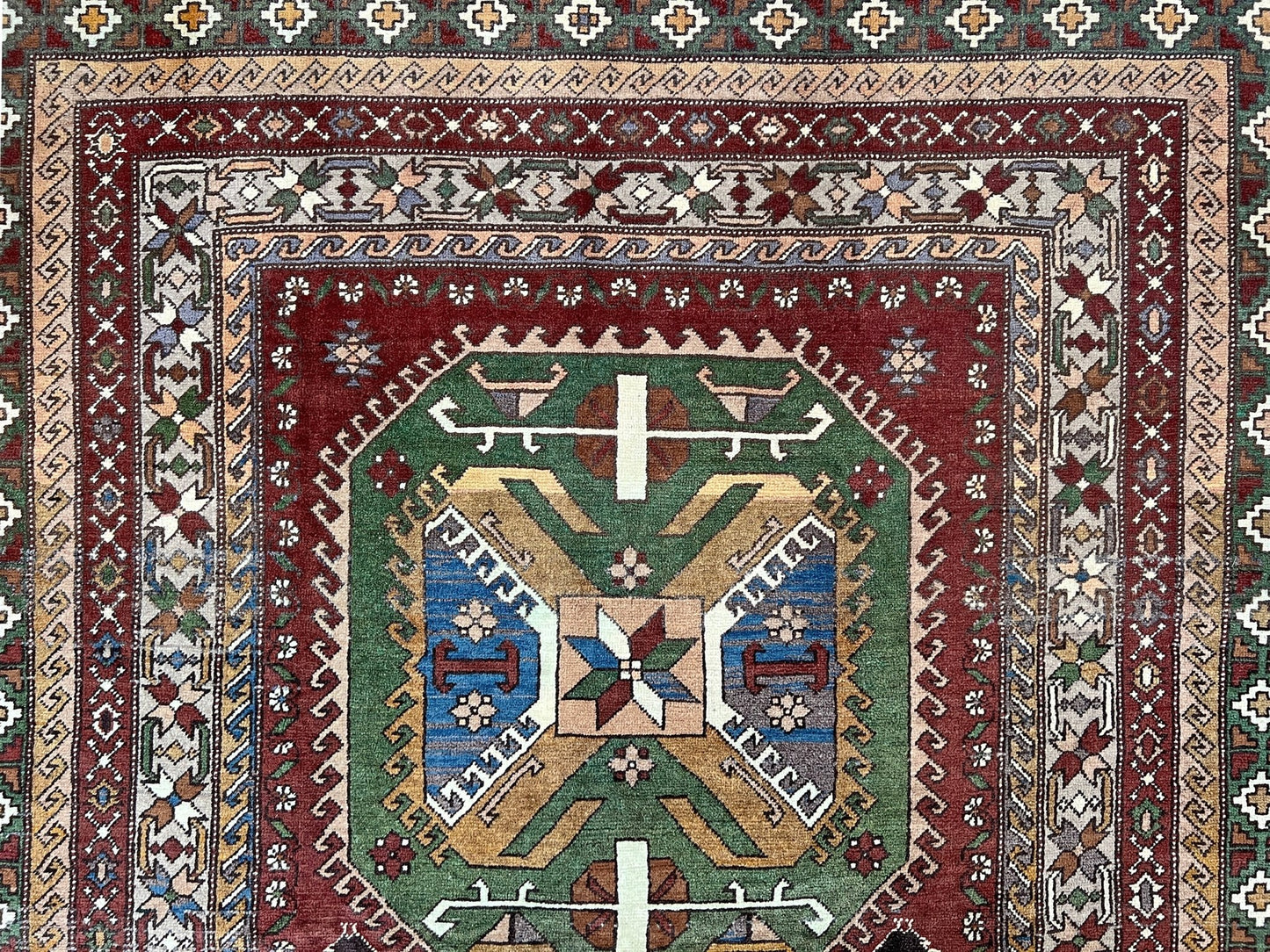 Kars kurdish handmade rug. 6x8 neutral color living room rug shop san francisco bay area. Vintage rug shop palo alto. Handmade rug in living room setting.