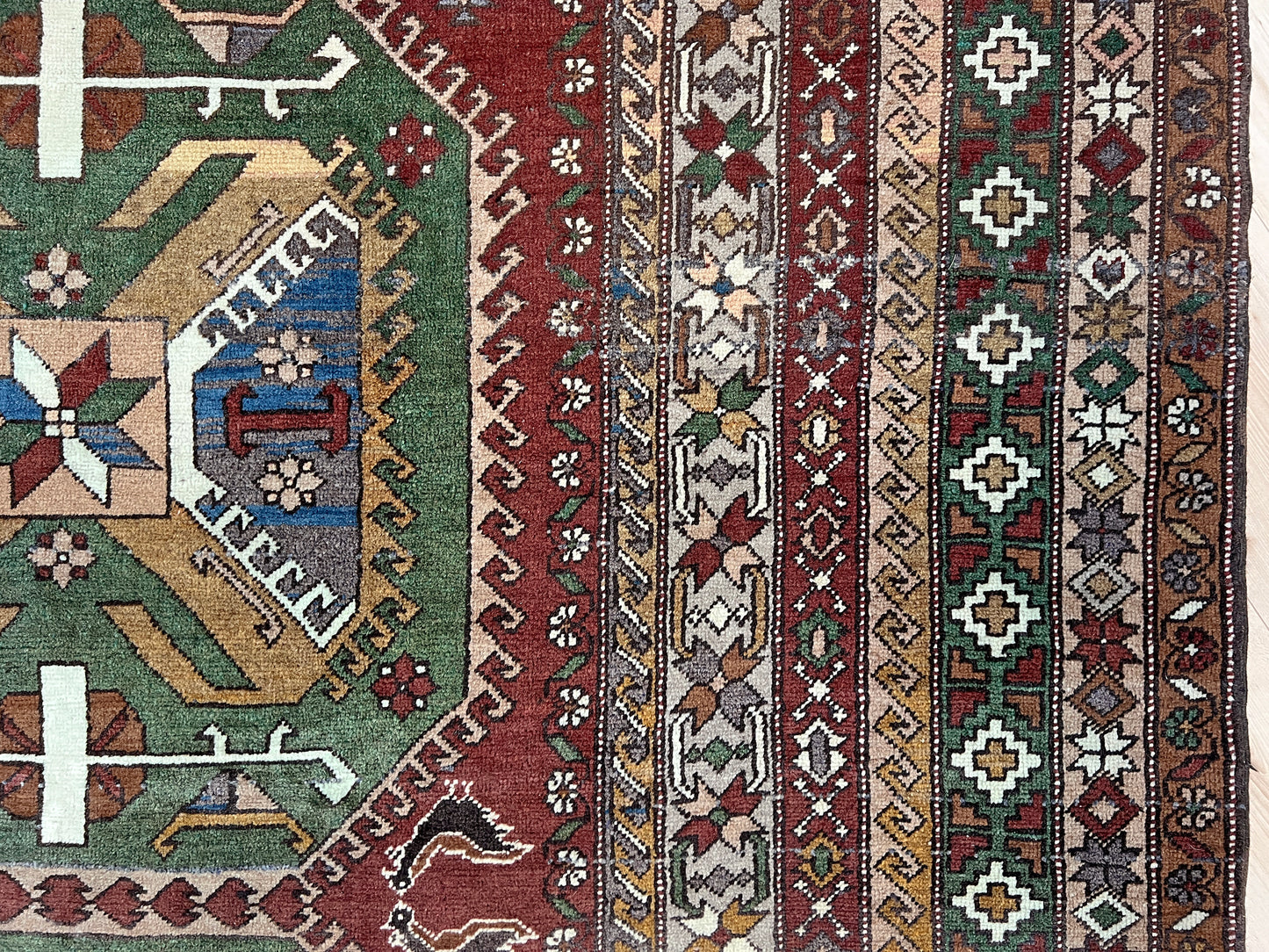 Kars kurdish handmade rug. 6x8 neutral color living room rug shop san francisco bay area. Vintage rug shop palo alto. Handmade rug in living room setting.