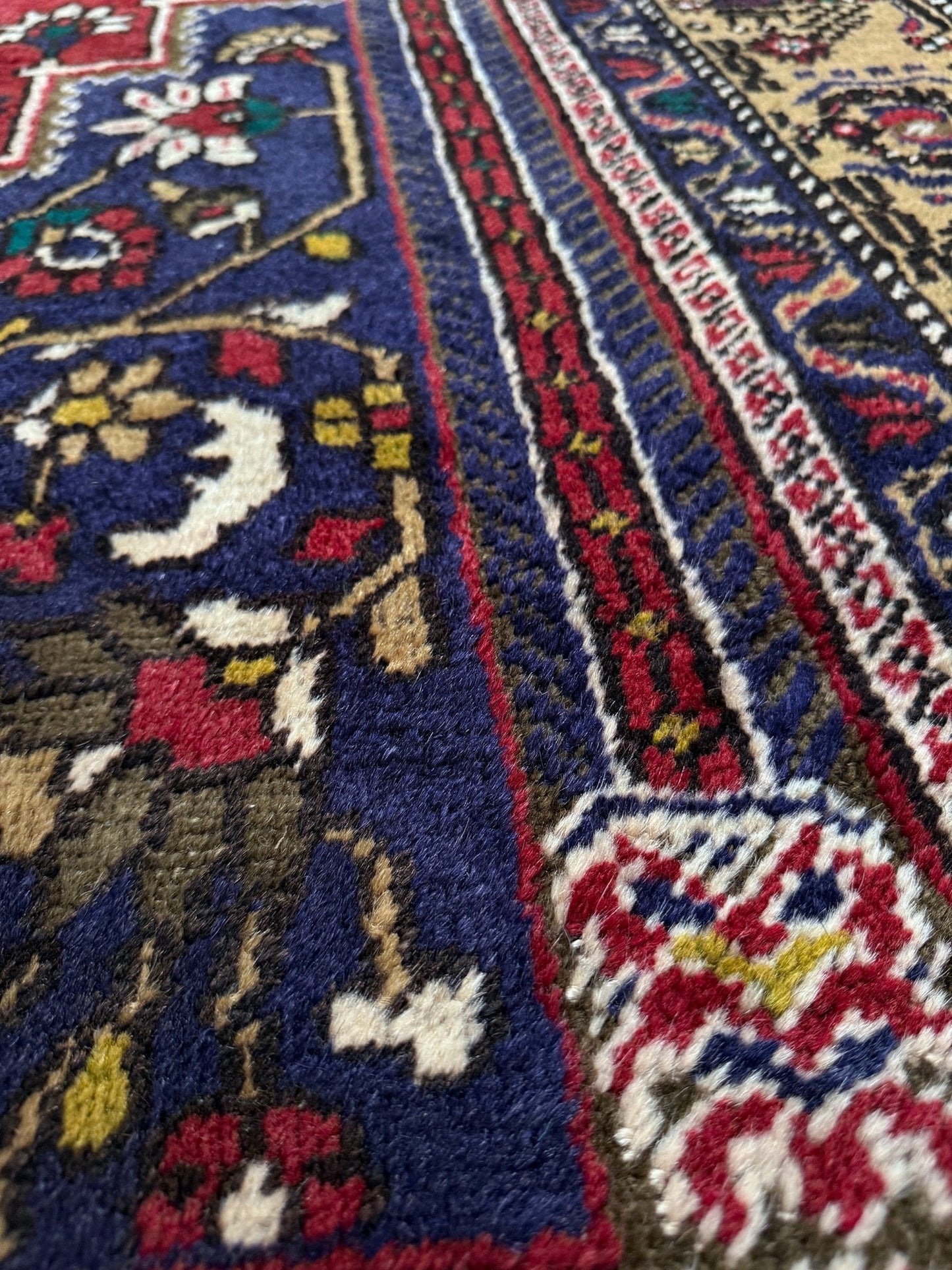 8x12 Taspinar vintage Turkish rug from the best rug shop in San Mateo, SF Bay Area, offering free shipping. This high-quality rug features rich crimson red, midnight blue, ivory, and golden beige hues, perfect for adding character to your bedroom, living room, or dining area.