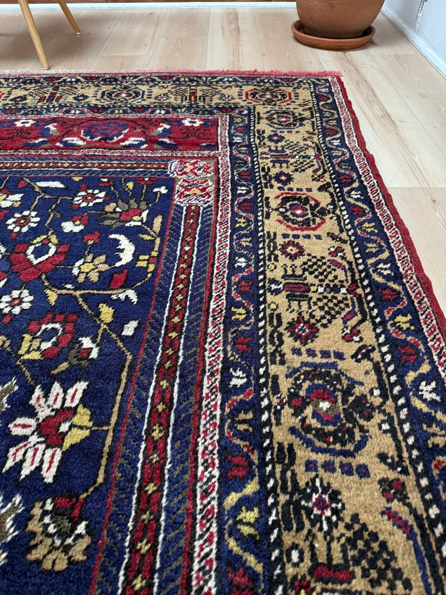 8x12 Taspinar vintage Turkish rug from the best rug shop in San Mateo, SF Bay Area, offering free shipping. This high-quality rug features rich crimson red, midnight blue, ivory, and golden beige hues, perfect for adding character to your bedroom, living room, or dining area.