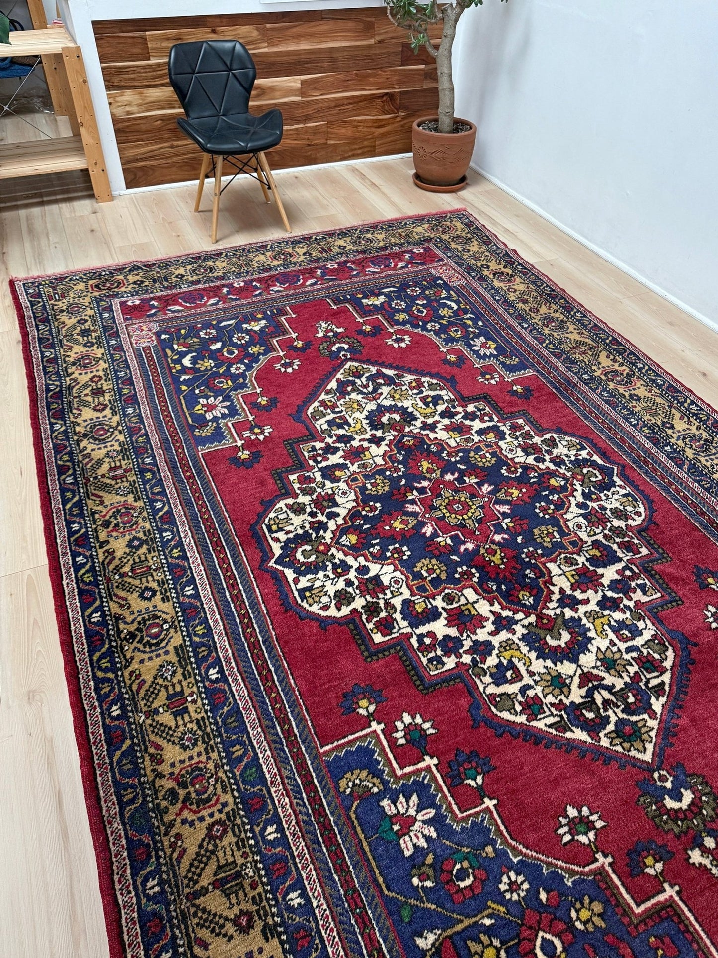 8x12 Taspinar vintage Turkish rug from the best rug shop in San Mateo, SF Bay Area, offering free shipping. This high-quality rug features rich crimson red, midnight blue, ivory, and golden beige hues, perfect for adding character to your bedroom, living room, or dining area.