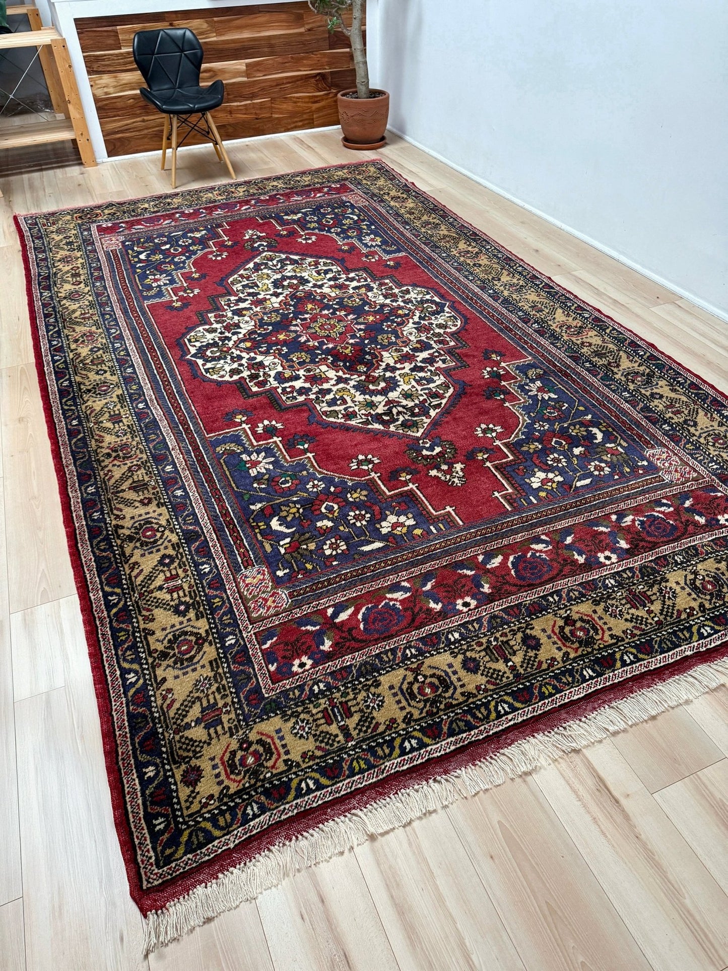 8x12 Taspinar vintage Turkish rug from the best rug shop in San Mateo, SF Bay Area, offering free shipping. This high-quality rug features rich crimson red, midnight blue, ivory, and golden beige hues, perfect for adding character to your bedroom, living room, or dining area.