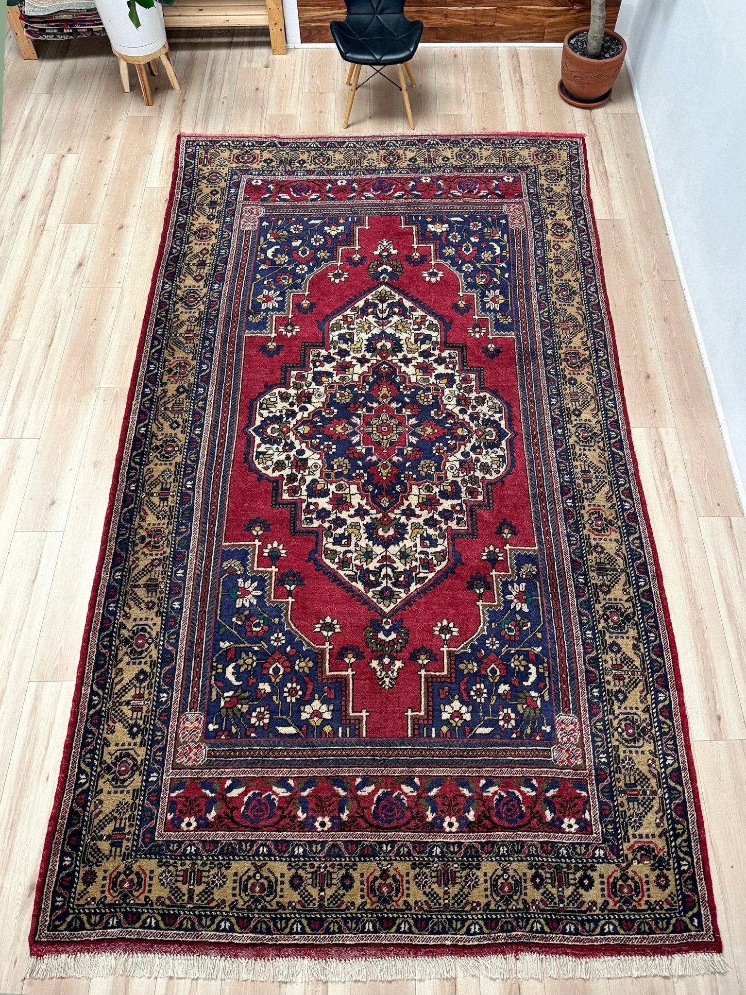 8x12 Taspinar vintage Turkish rug from the best rug shop in San Mateo, SF Bay Area, offering free shipping. This high-quality rug features rich crimson red, midnight blue, ivory, and golden beige hues, perfect for adding character to your bedroom, living room, or dining area.