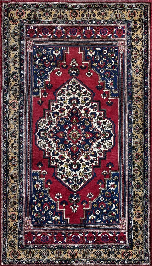 8x12 Taspinar vintage Turkish rug from the best rug shop in San Mateo, SF Bay Area, offering free shipping. This high-quality rug features rich crimson red, midnight blue, ivory, and golden beige hues, perfect for adding character to your bedroom, living room, or dining area.