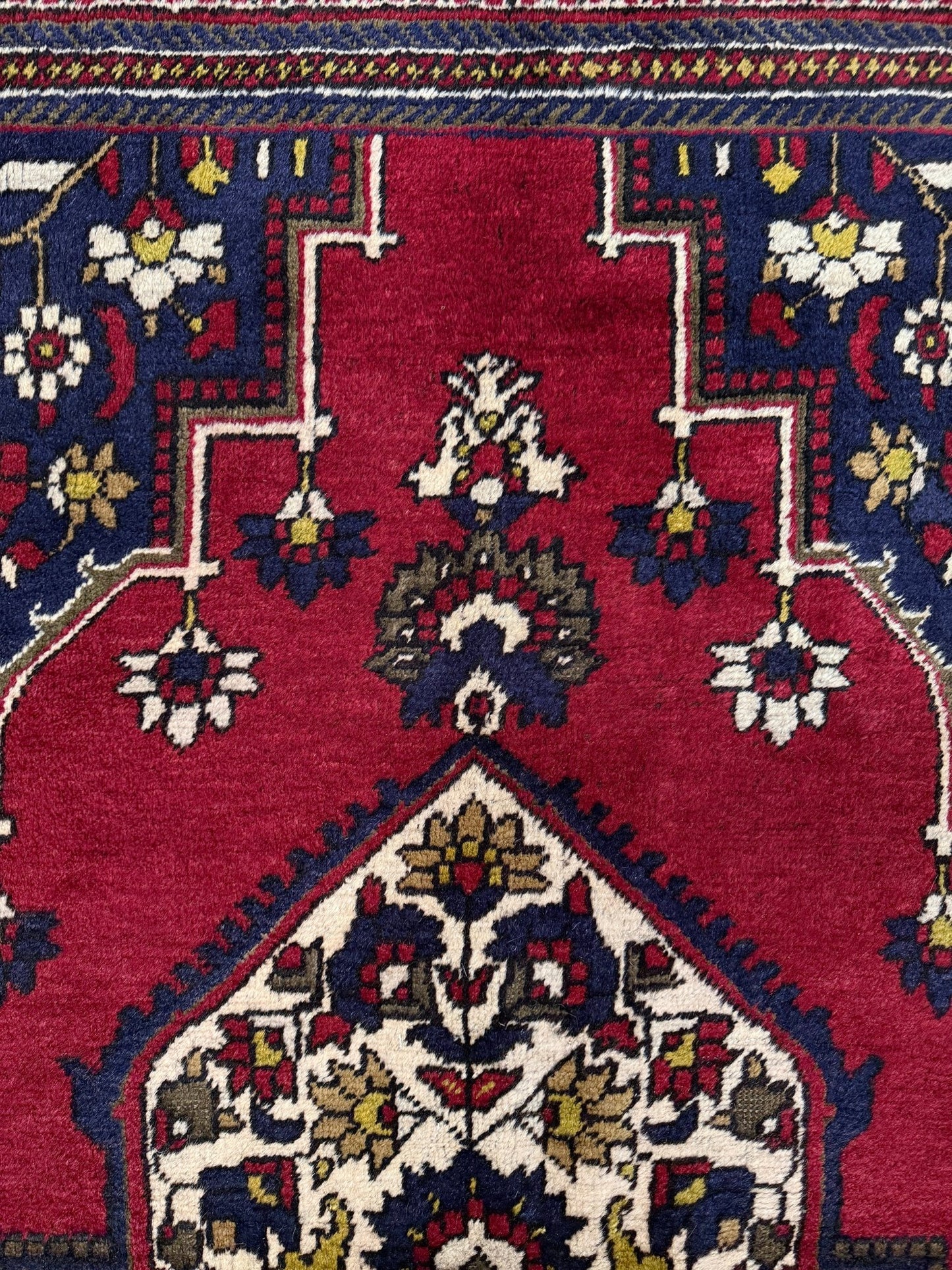 8x12 Taspinar vintage Turkish rug from the best rug shop in San Mateo, SF Bay Area, offering free shipping. This high-quality rug features rich crimson red, midnight blue, ivory, and golden beige hues, perfect for adding character to your bedroom, living room, or dining area.