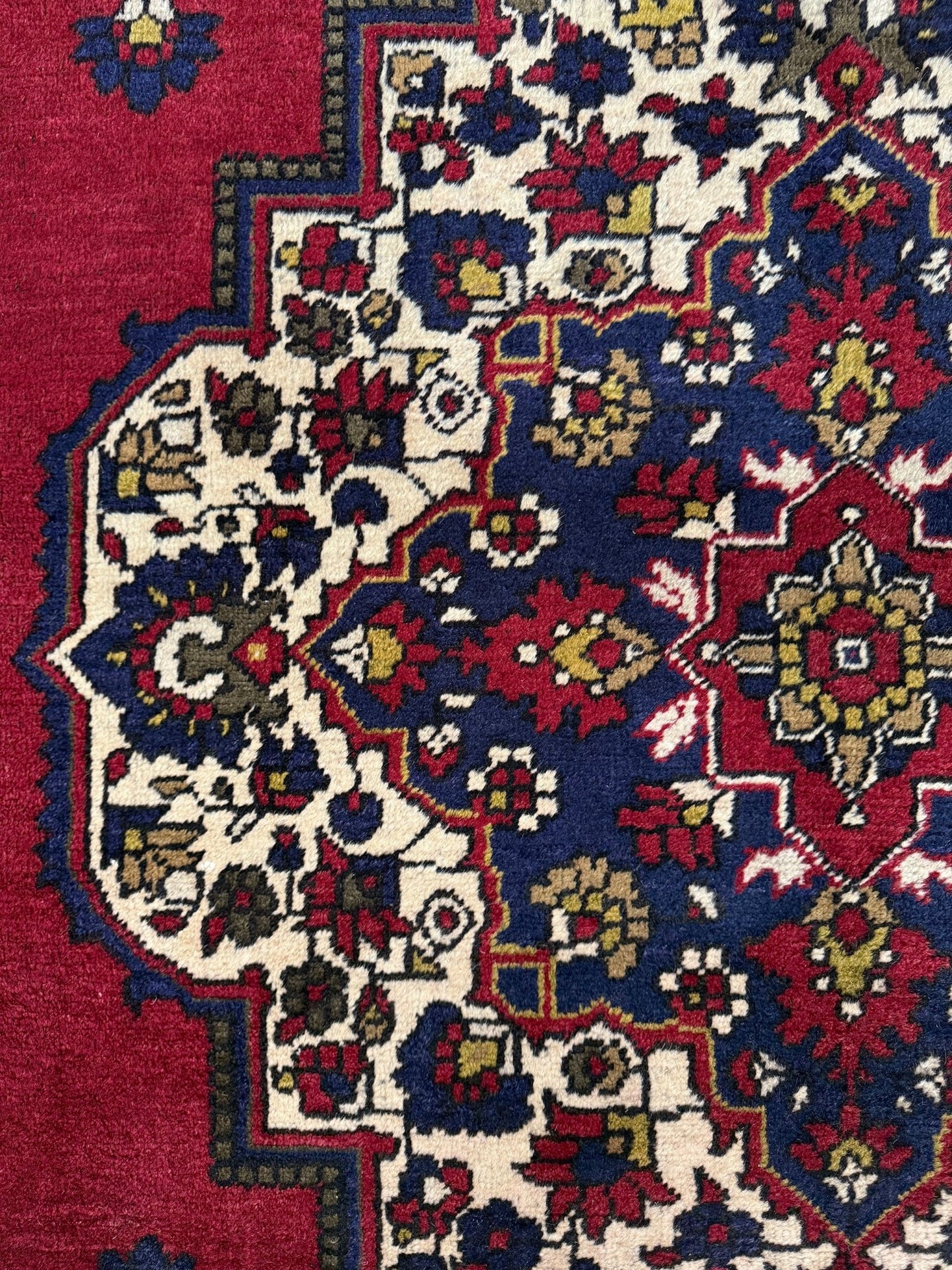 8x12 Taspinar vintage Turkish rug from the best rug shop in San Mateo, SF Bay Area, offering free shipping. This high-quality rug features rich crimson red, midnight blue, ivory, and golden beige hues, perfect for adding character to your bedroom, living room, or dining area.