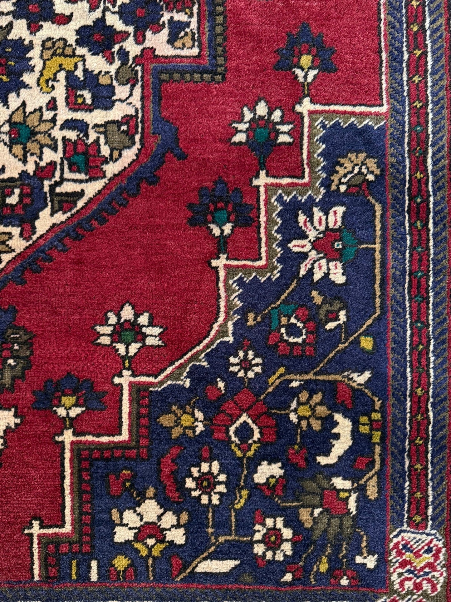 8x12 Taspinar vintage Turkish rug from the best rug shop in Burlingame, SF Bay Area, offering free shipping. This high-quality rug features rich crimson red, midnight blue, ivory, and golden beige hues, perfect for adding character to your bedroom, living room, or dining area.