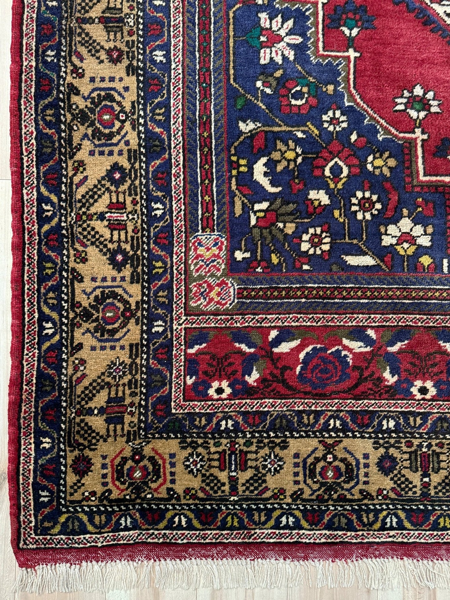 8x12 Taspinar vintage Turkish rug from the best rug shop in Burlingame, SF Bay Area, offering free shipping. This high-quality rug features rich crimson red, midnight blue, ivory, and golden beige hues, perfect for adding character to your bedroom, living room, or dining area.