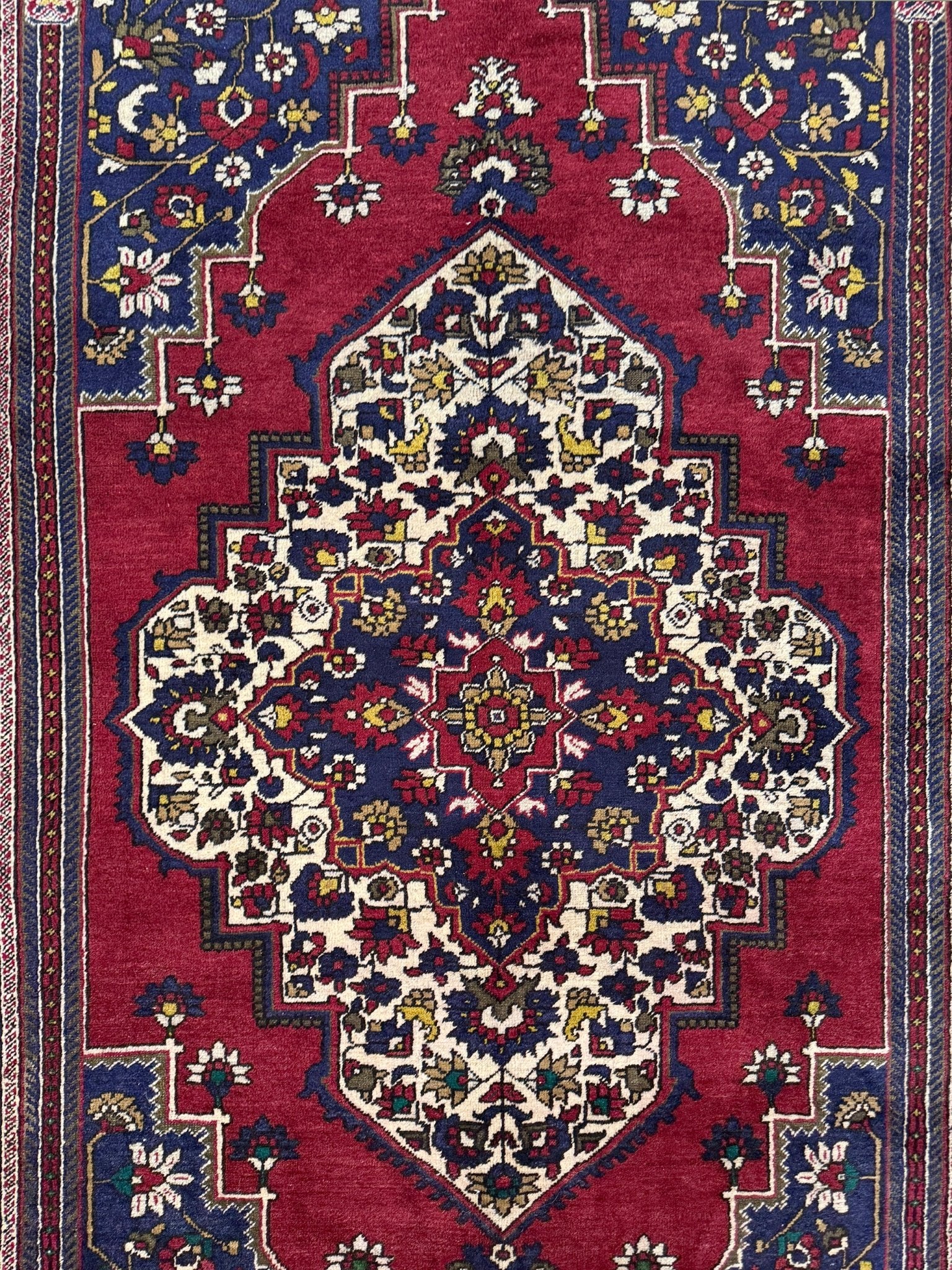 8x12 Taspinar vintage Turkish rug from the best rug shop in San Mateo, SF Bay Area, offering free shipping. This high-quality rug features rich crimson red, midnight blue, ivory, and golden beige hues, perfect for adding character to your bedroom, living room, or dining area.