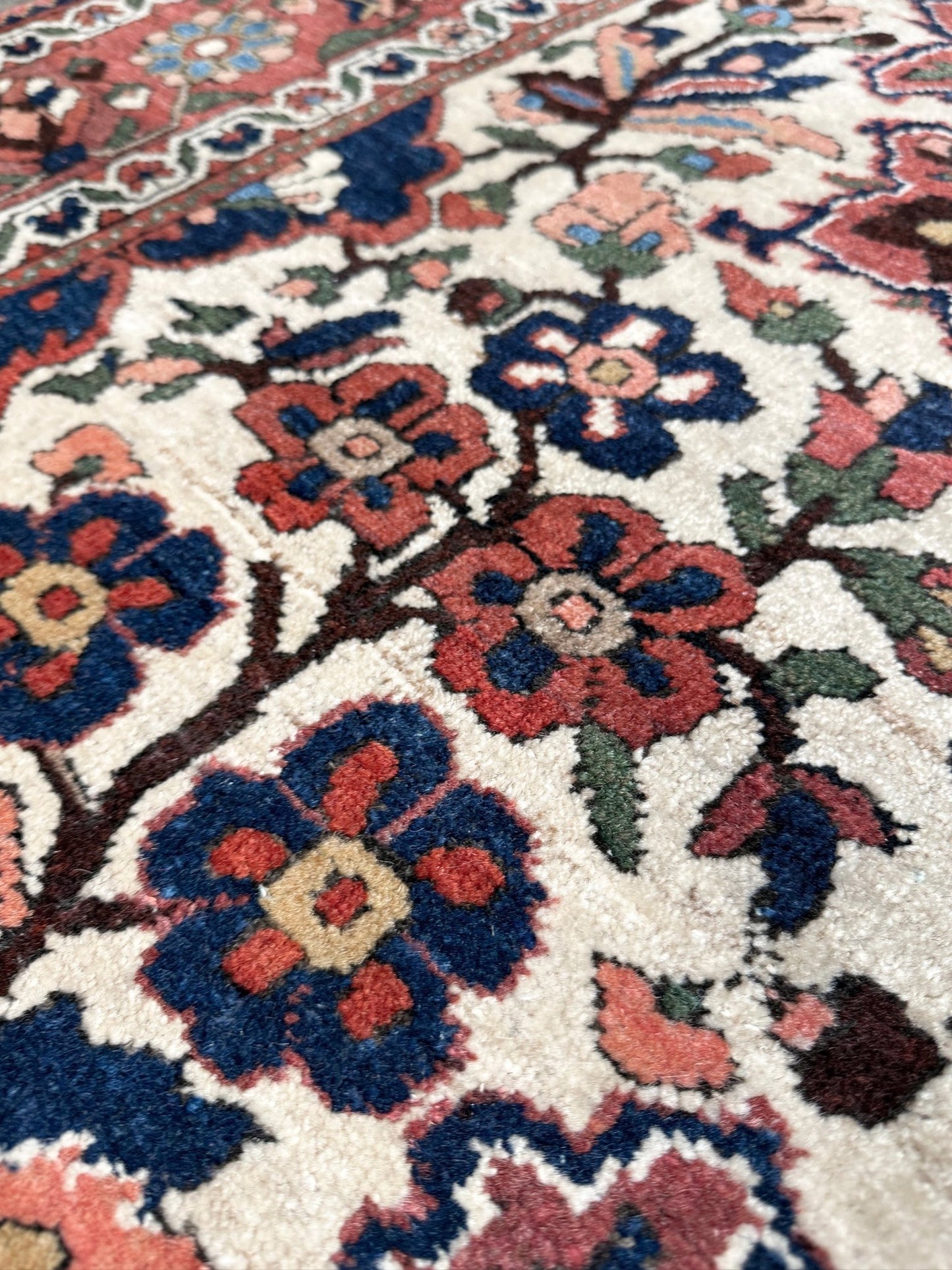 vintage persian bakhtiari floral rug 5x7 dusty brick red navy ivory hand knotted wool medallion rug mid century persian carpet san francisco bay area rug shop indigo rugs