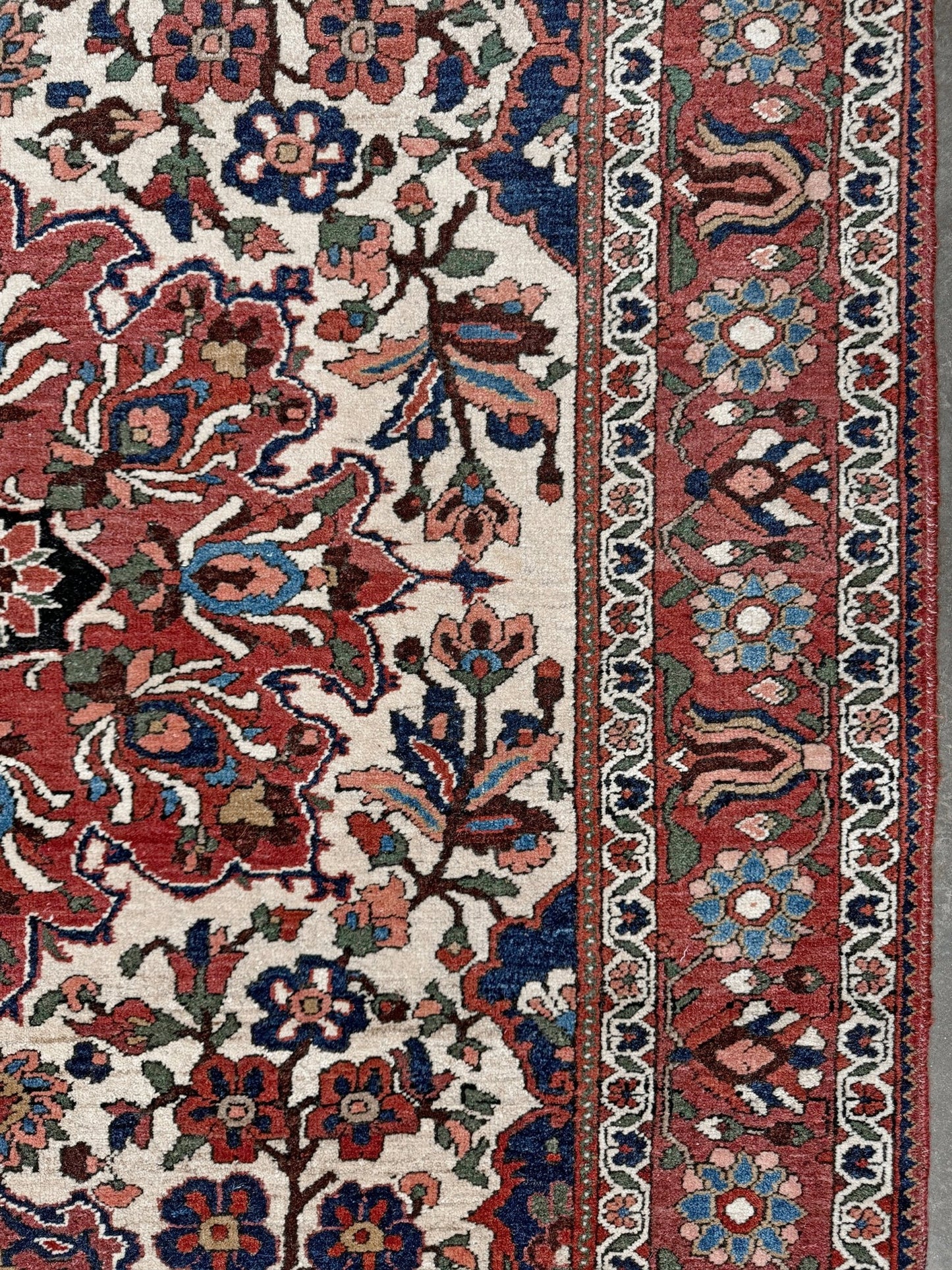 vintage persian bakhtiari floral rug 5x7 dusty brick red navy ivory hand knotted wool medallion rug mid century persian carpet san francisco bay area rug shop indigo rugs