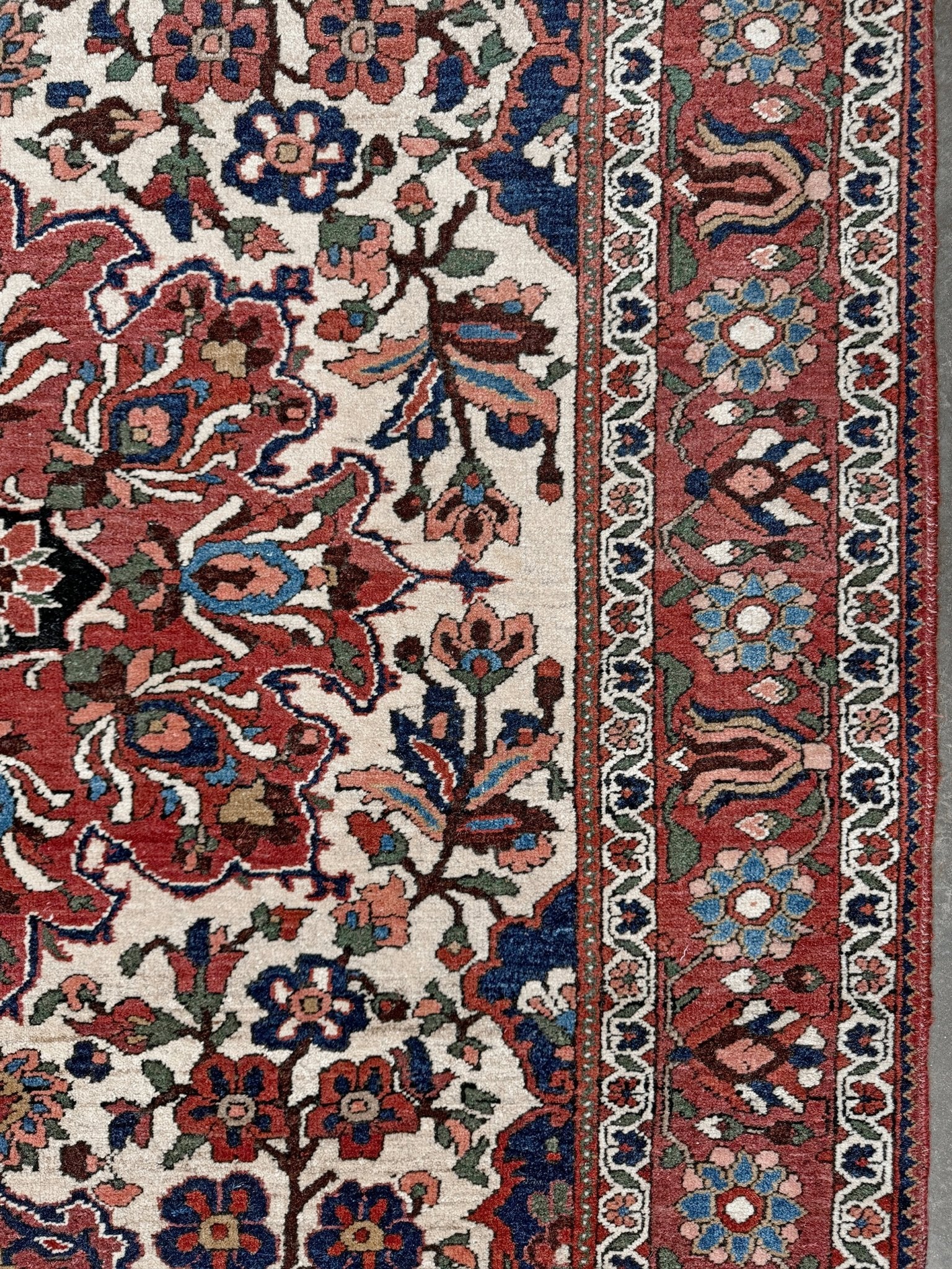 vintage persian bakhtiari floral rug 5x7 dusty brick red navy ivory hand knotted wool medallion rug mid century persian carpet san francisco bay area rug shop indigo rugs