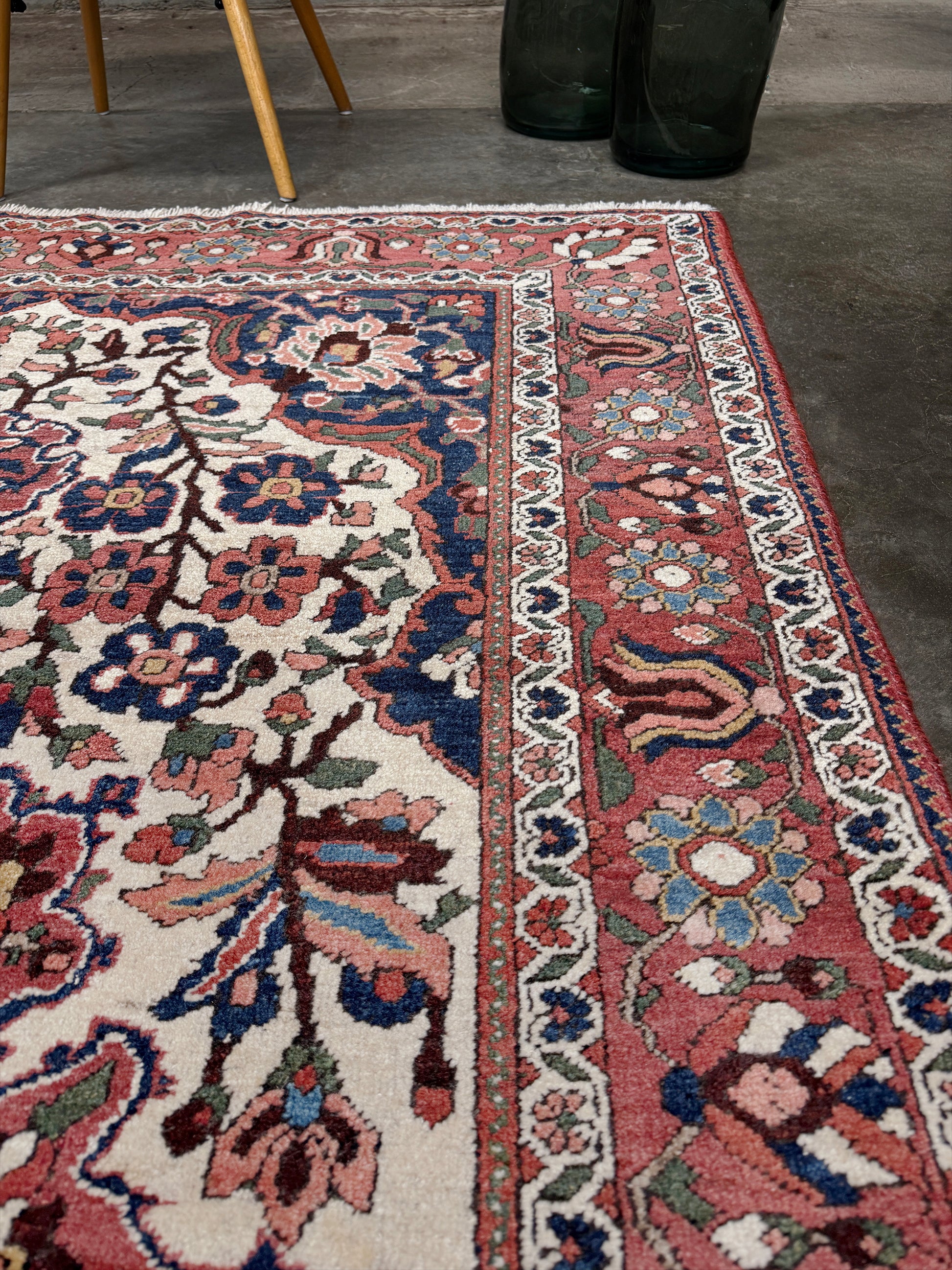 vintage persian bakhtiari floral rug 5x7 dusty brick red navy ivory hand knotted wool medallion rug mid century persian carpet san francisco bay area rug shop indigo rugs