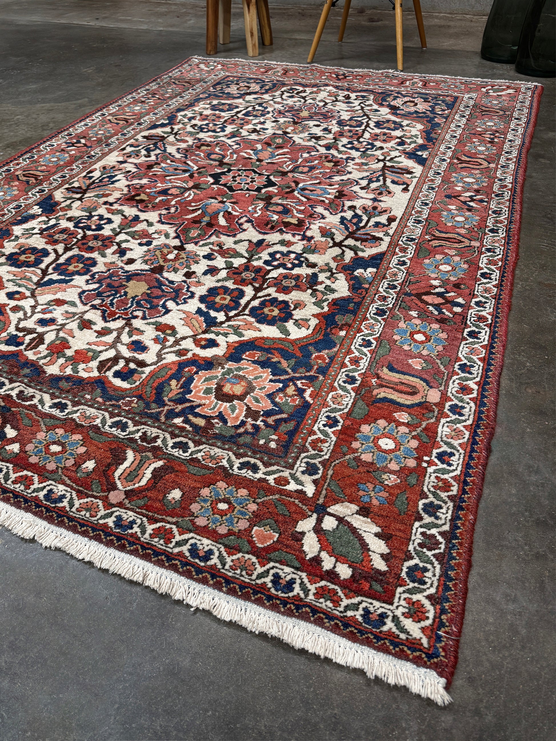 vintage persian bakhtiari floral rug 5x7 dusty brick red navy ivory hand knotted wool medallion rug mid century persian carpet san francisco bay area rug shop indigo rugs