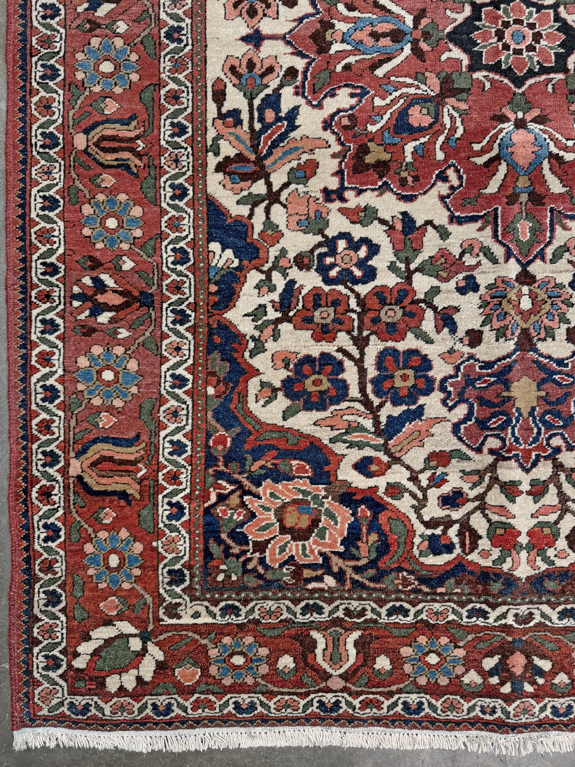 vintage persian bakhtiari floral rug 5x7 dusty brick red navy ivory hand knotted wool medallion rug mid century persian carpet san francisco bay area rug shop indigo rugs