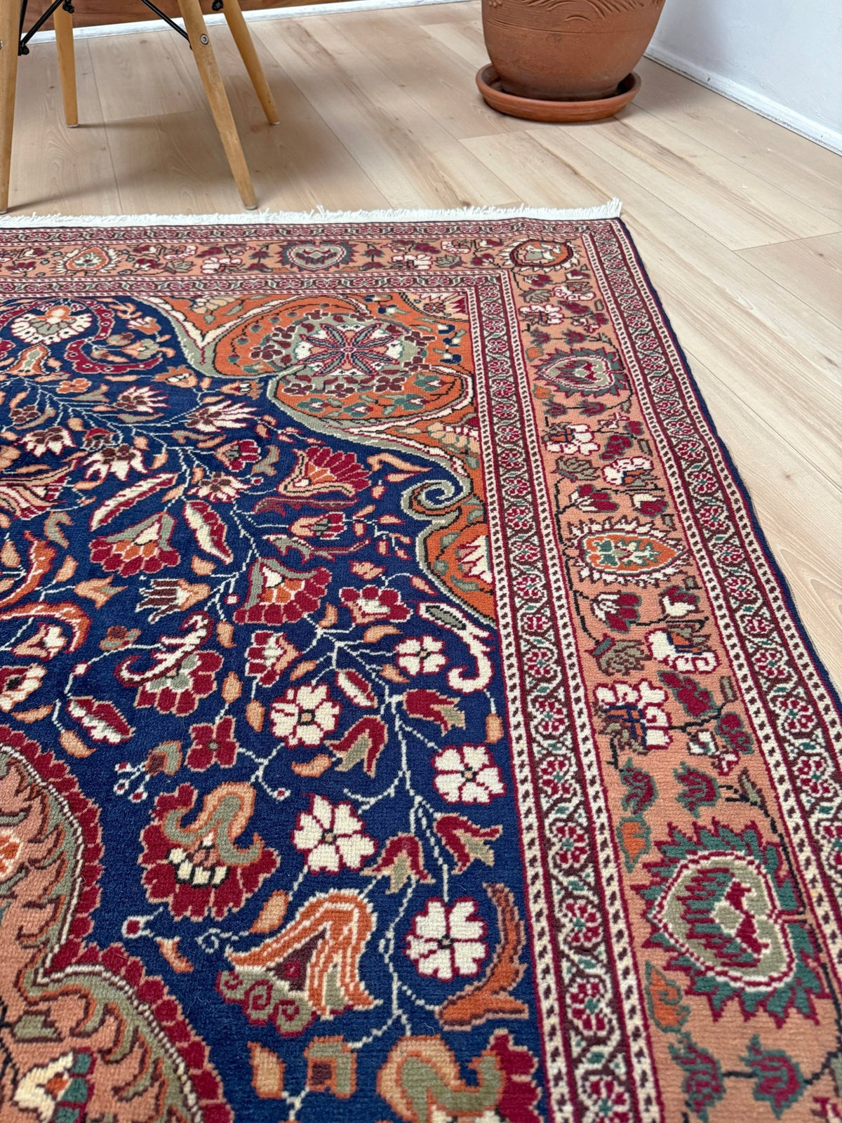 5x7 Navy Kayseri Turkish rug with peach medallion, floral vines, handmade wool from Indigo Rugs Burlingame Bay Area.