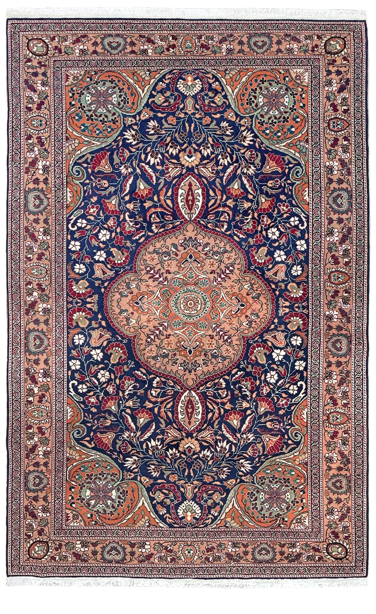 A traditional Persian-style area rug with a large central medallion, featuring a navy blue field, a peach and orange central medallion, and intricate floral motifs in red, green, beige, and white throughout the borders. 5x7 Navy Kayseri Turkish rug with peach medallion, floral vines, handmade wool from Indigo Rugs Burlingame Bay Area.