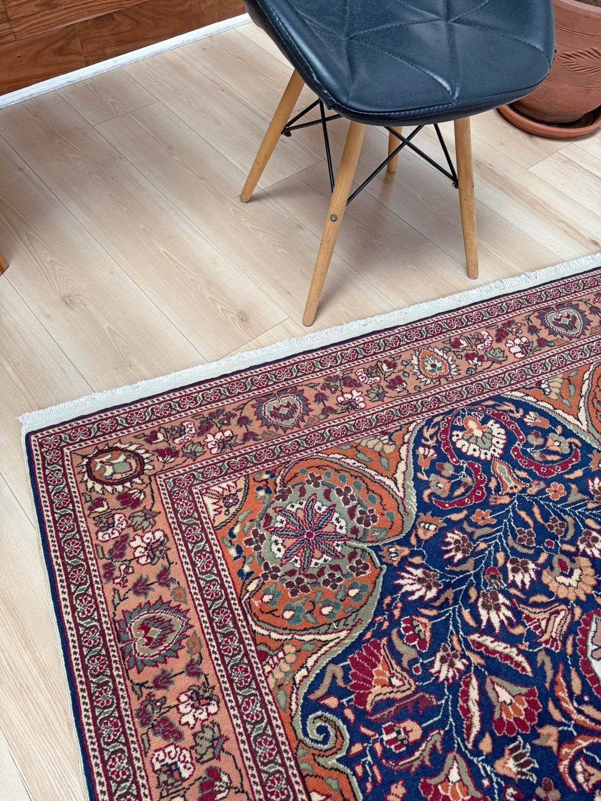 5x7 Navy Kayseri Turkish rug with peach medallion, floral vines, handmade wool from Indigo Rugs Burlingame Bay Area.