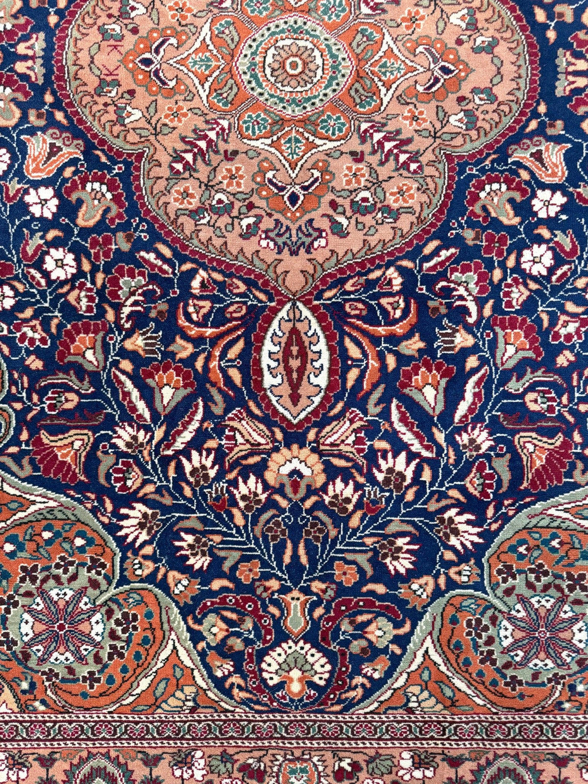 5x7 Navy Kayseri Turkish rug with peach medallion, floral vines, handmade wool from Indigo Rugs Burlingame Bay Area.