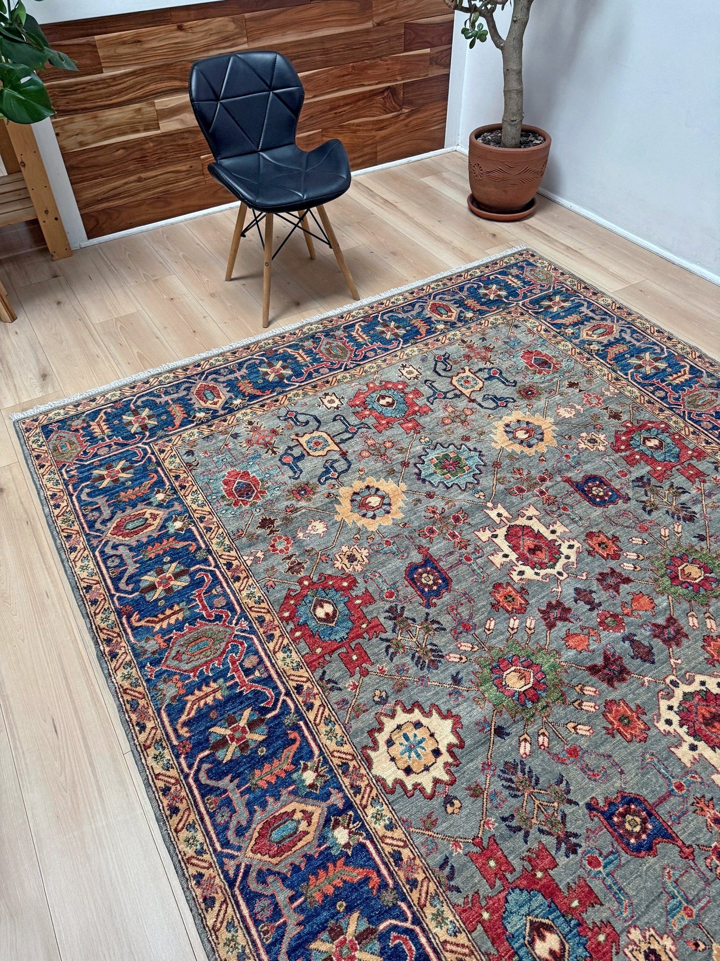 7x9 Fine handmade Ghazni wool Bijar rug with dusty blue, navy, and brick red tones, available at a rug shop in the San Francisco Bay Area. Perfect for living room, bedroom, or dining spaces. High-quality, durable Persian wool carpet with intricate floral and geometric motifs. Free shipping.