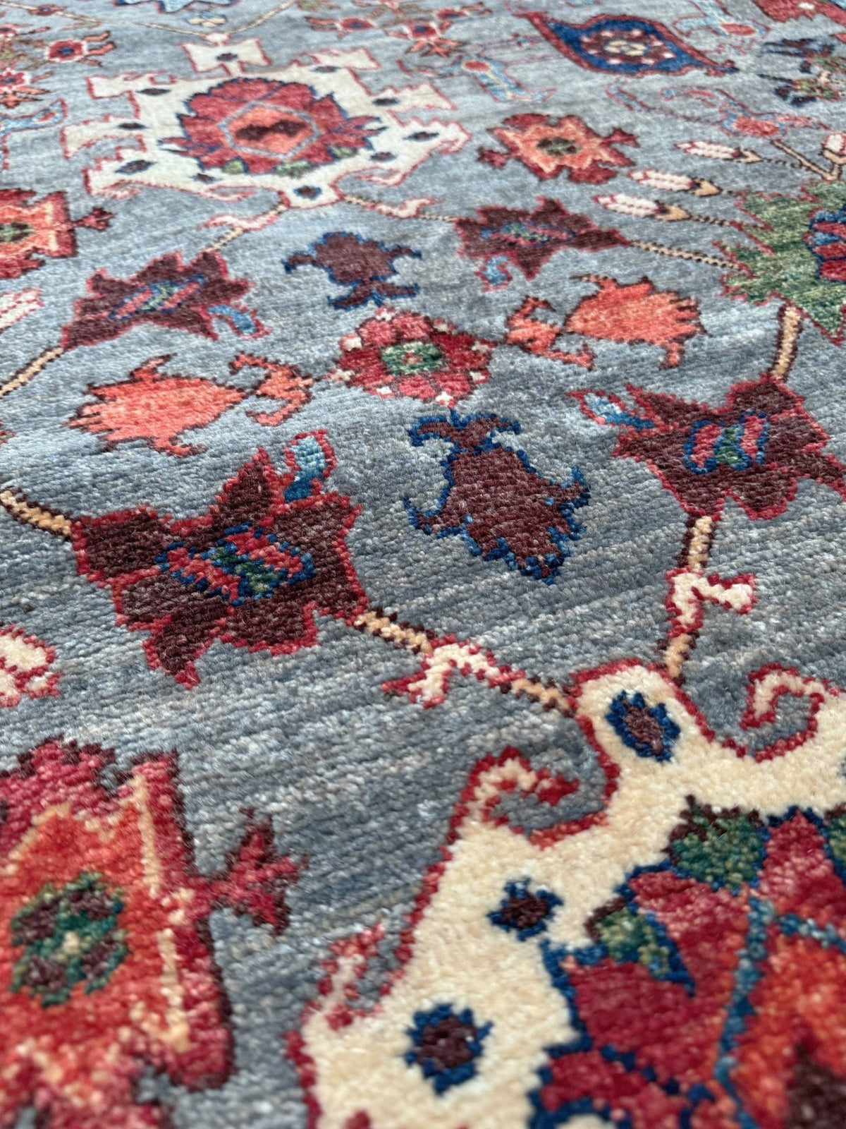 Blue gray Bijar Turkish rug with deep navy border, floral geometric motifs, handmade wool 7x10 from Indigo Rugs Burlingame CA Bay Area
