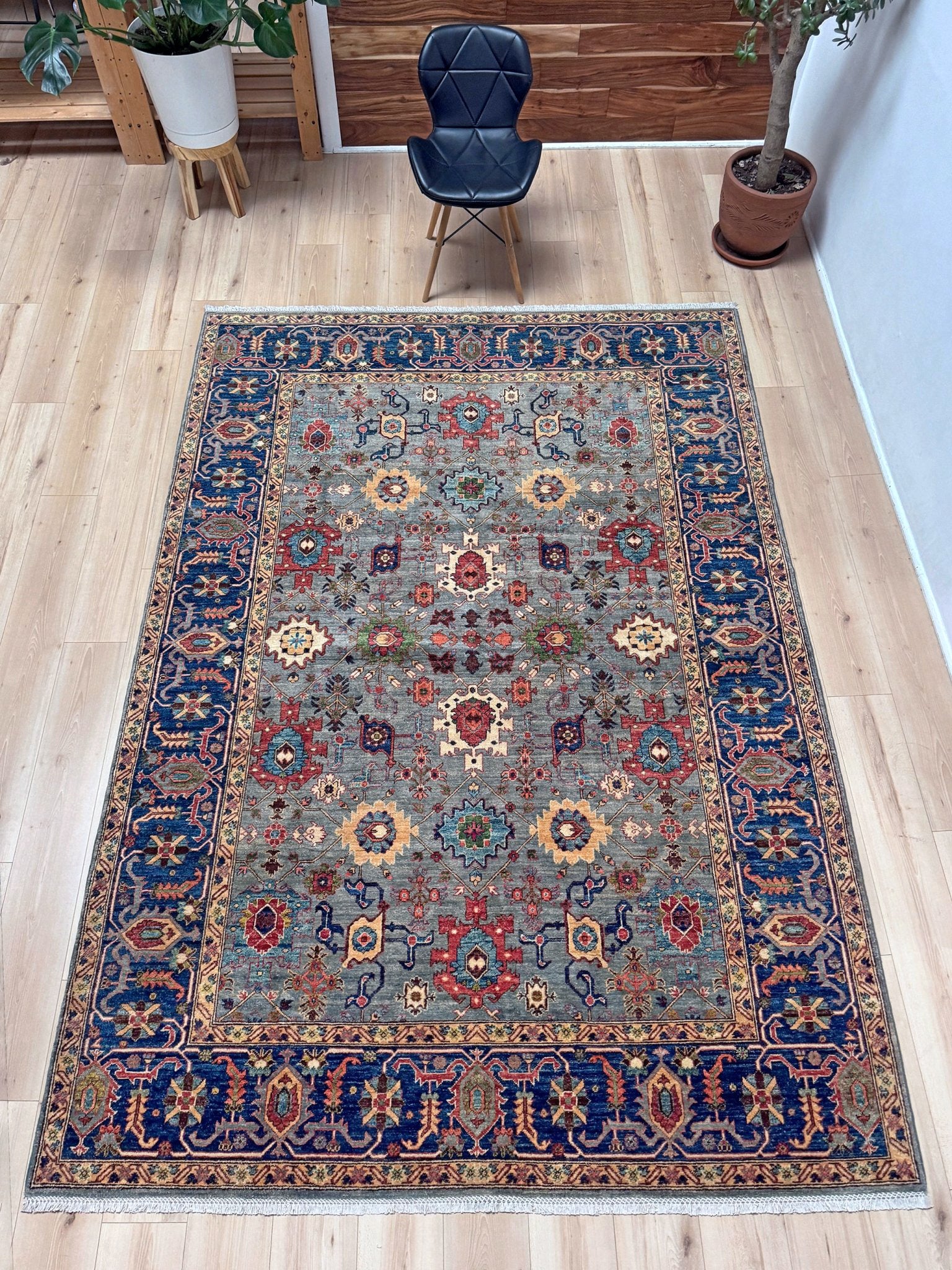 7x9 Fine handmade Ghazni wool Bijar rug with dusty blue, navy, and brick red tones, available at a rug shop in the San Francisco Bay Area. Perfect for living room, bedroom, or dining spaces. High-quality, durable Persian wool carpet with intricate floral and geometric motifs. Free shipping.
