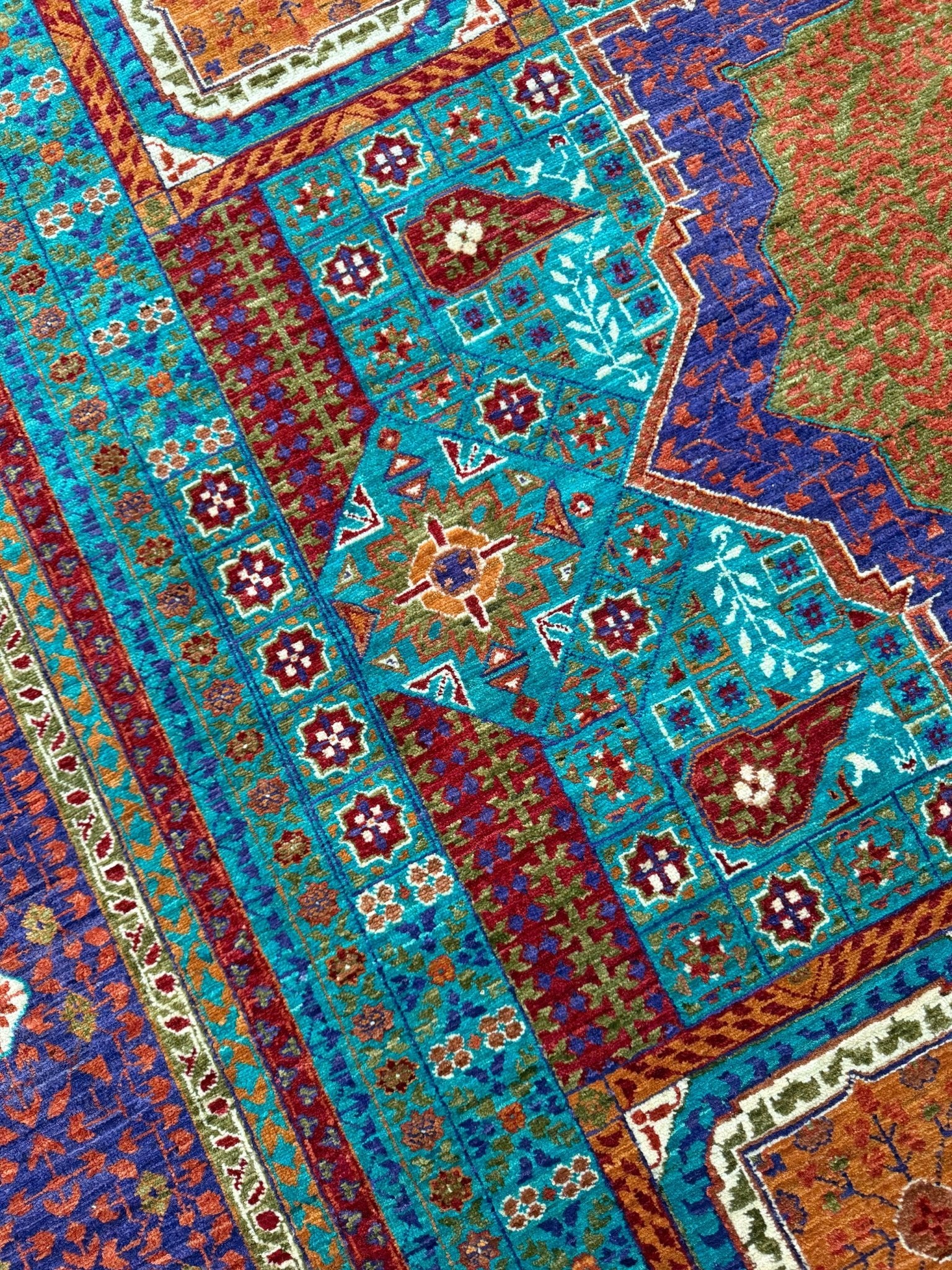 45x45 Top-quality 8x10 Sultanate Mamluk rug from the best rug shop in San Mateo, SF Bay Area. It features rich turquoise, royal purple, and saffron hues with intricate geometric patterns. Perfect for a bedroom, living room, or dining space, adding character and timeless elegance. Free shipping available.