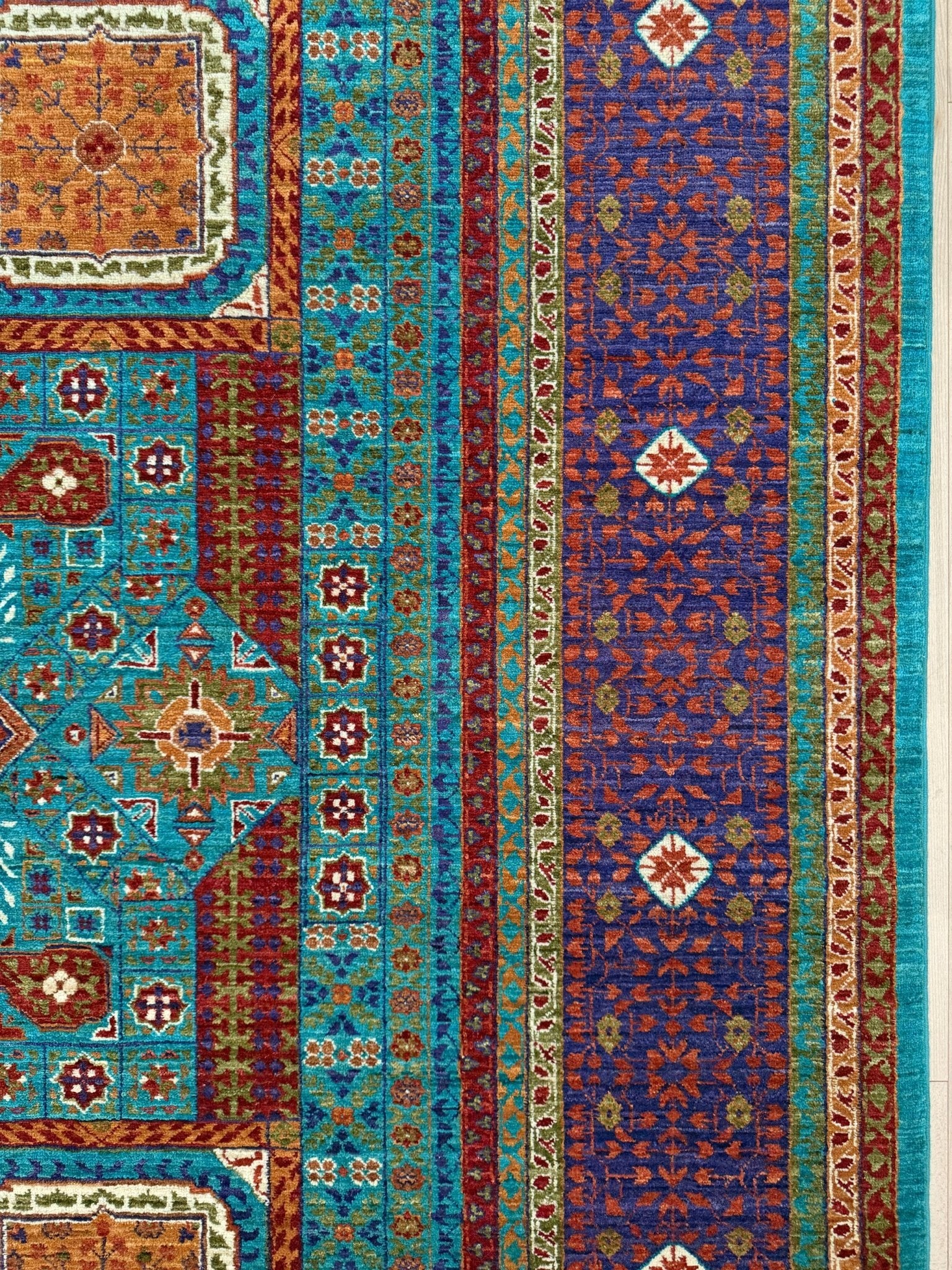 45x45 Top-quality 8x10 Sultanate Mamluk rug from the best rug shop in San Mateo, SF Bay Area. It features rich turquoise, royal purple, and saffron hues with intricate geometric patterns. Perfect for a bedroom, living room, or dining space, adding character and timeless elegance. Free shipping available.
