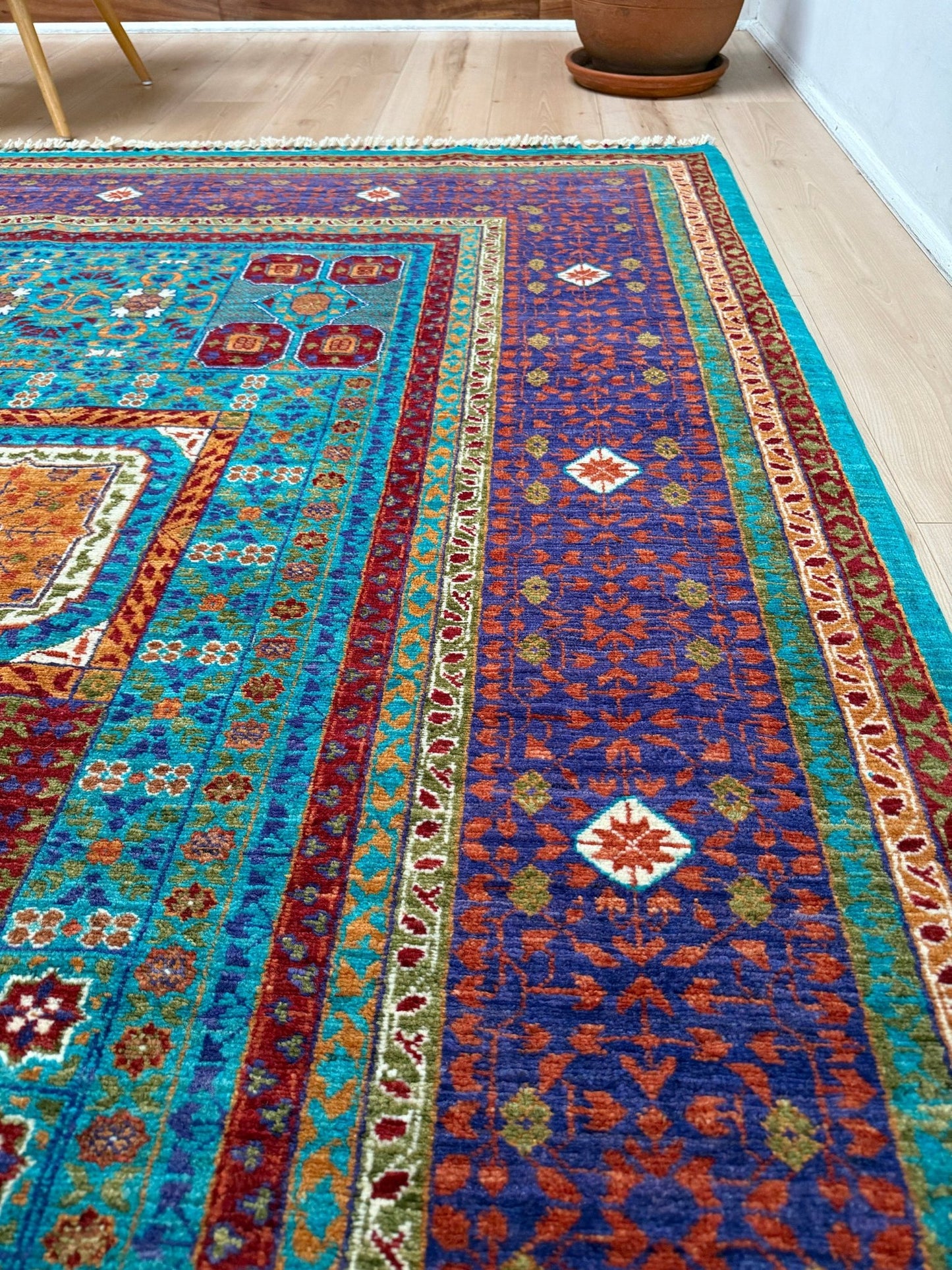 45x45 Top-quality 8x10 Sultanate Mamluk rug from the best rug shop in San Mateo, SF Bay Area. It features rich turquoise, royal purple, and saffron hues with intricate geometric patterns. Perfect for a bedroom, living room, or dining space, adding character and timeless elegance. Free shipping available.