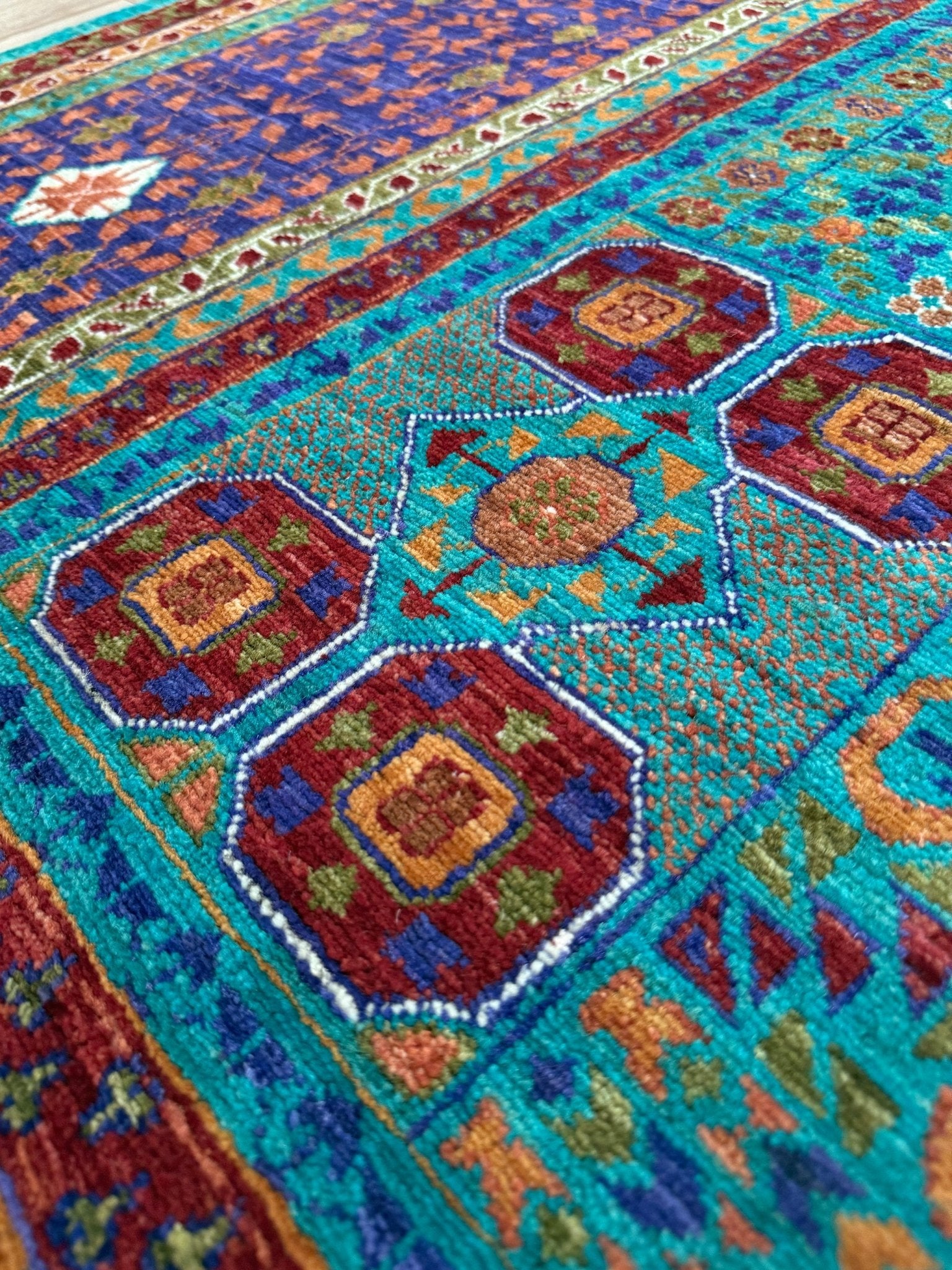 45x45 Top-quality 8x10 Sultanate Mamluk rug from the best rug shop in San Mateo, SF Bay Area. It features rich turquoise, royal purple, and saffron hues with intricate geometric patterns. Perfect for a bedroom, living room, or dining space, adding character and timeless elegance. Free shipping available.