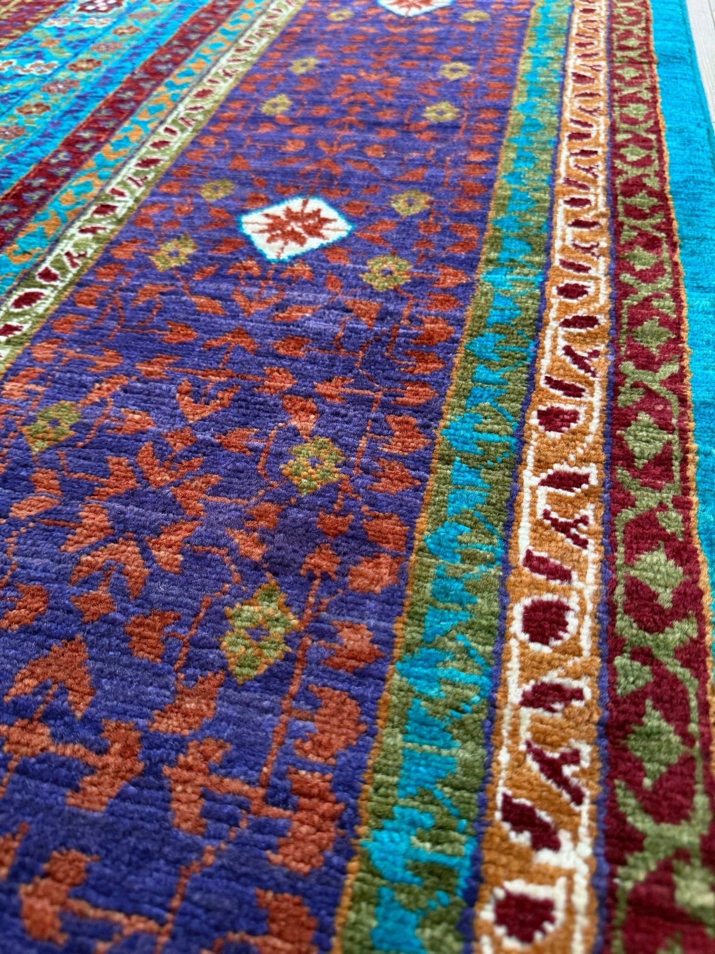 45x45 Top-quality 8x10 Sultanate Mamluk rug from the best rug shop in San Mateo, SF Bay Area. It features rich turquoise, royal purple, and saffron hues with intricate geometric patterns. Perfect for a bedroom, living room, or dining space, adding character and timeless elegance. Free shipping available.