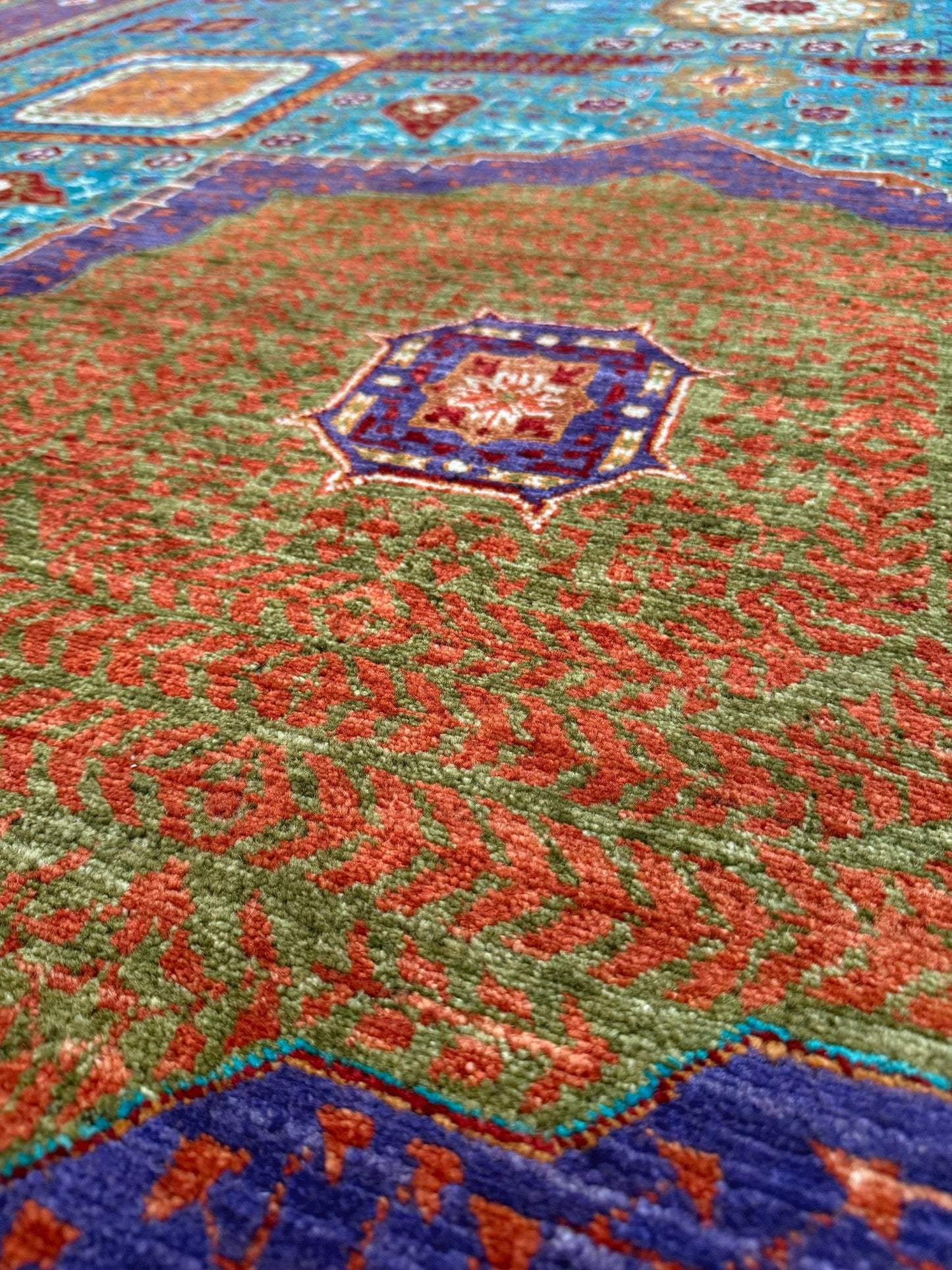 45x45 Top-quality 8x10 Sultanate Mamluk rug from the best rug shop in San Mateo, SF Bay Area. It features rich turquoise, royal purple, and saffron hues with intricate geometric patterns. Perfect for a bedroom, living room, or dining space, adding character and timeless elegance. Free shipping available.