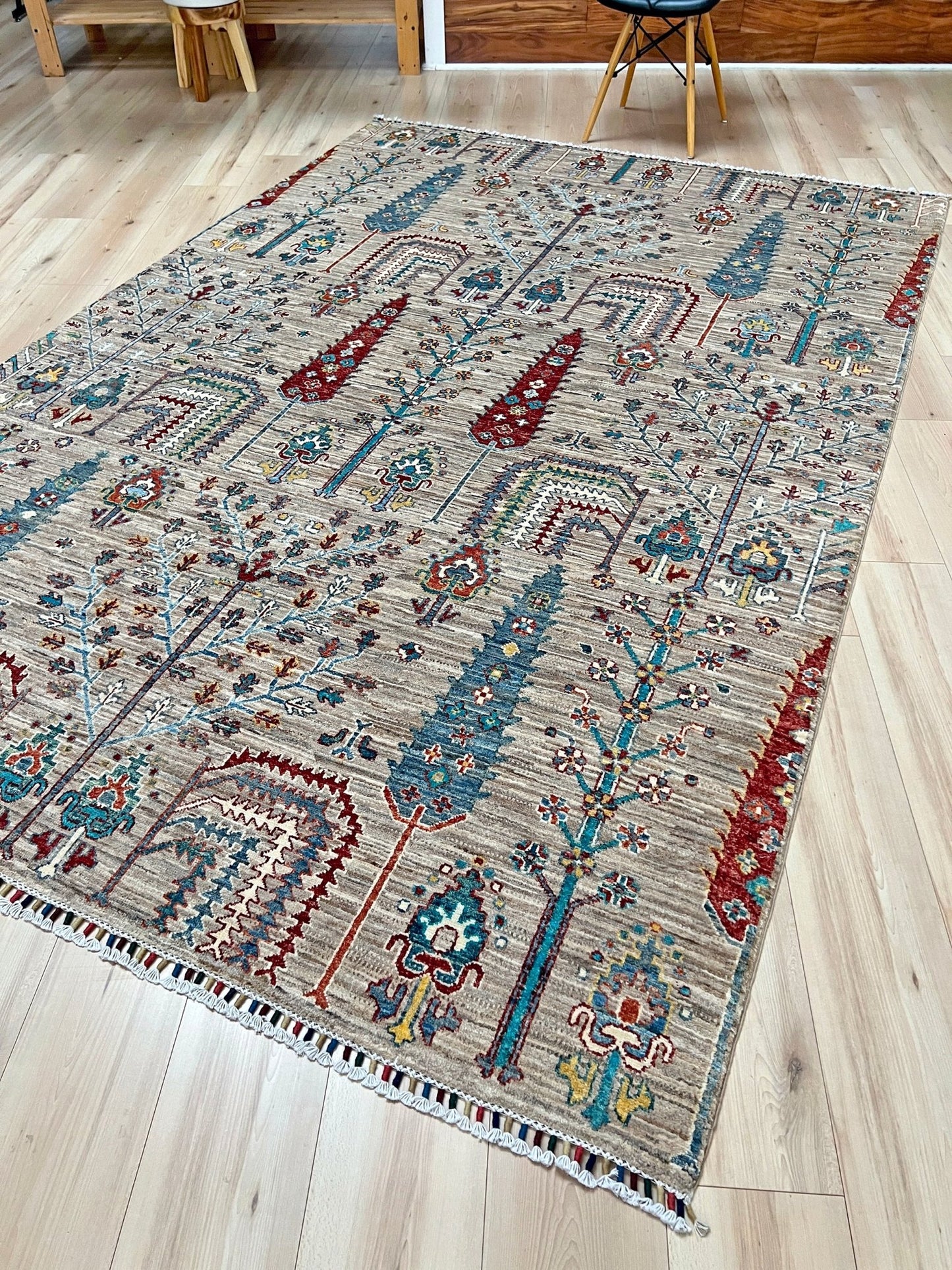 Tree of Life rug from the best luxury handmade rug shop in the San Francisco Bay Area. This exquisite piece features intricate patterns and vibrant colors, perfect for adding elegance to any space. Enjoy free shipping with your purchase.