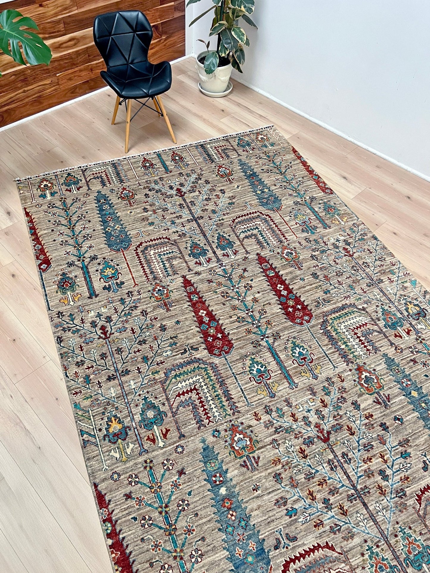 Tree of Life rug from the best luxury handmade rug shop in the San Francisco Bay Area. This exquisite piece features intricate patterns and vibrant colors, perfect for adding elegance to any space. Enjoy free shipping with your purchase.