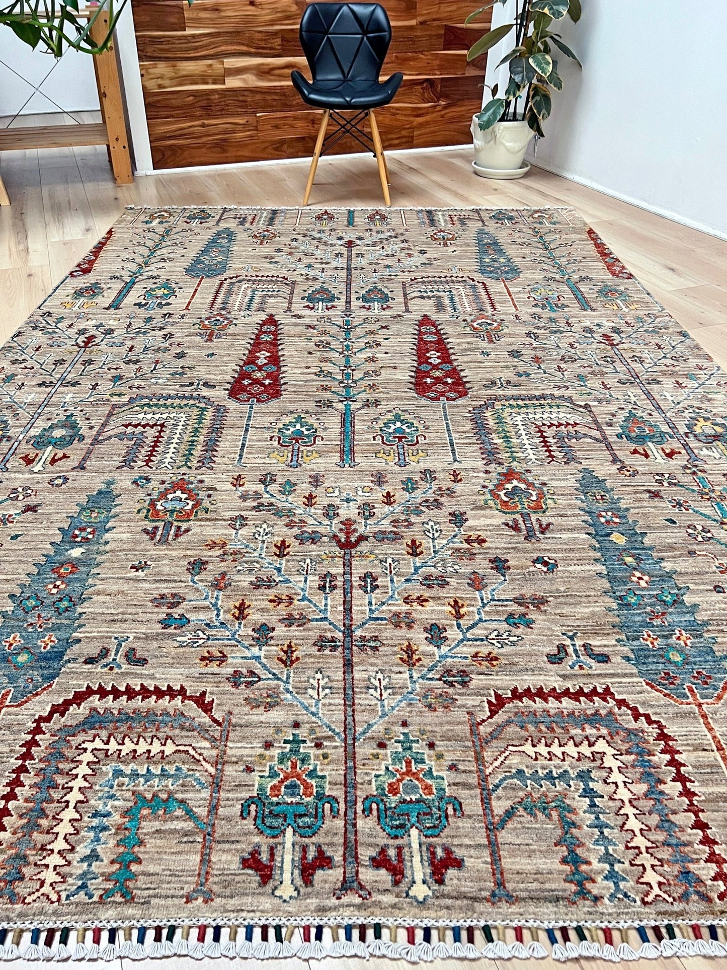 Tree of Life rug from the best luxury handmade rug shop in the San Francisco Bay Area. This exquisite piece features intricate patterns and vibrant colors, perfect for adding elegance to any space. Enjoy free shipping with your purchase.