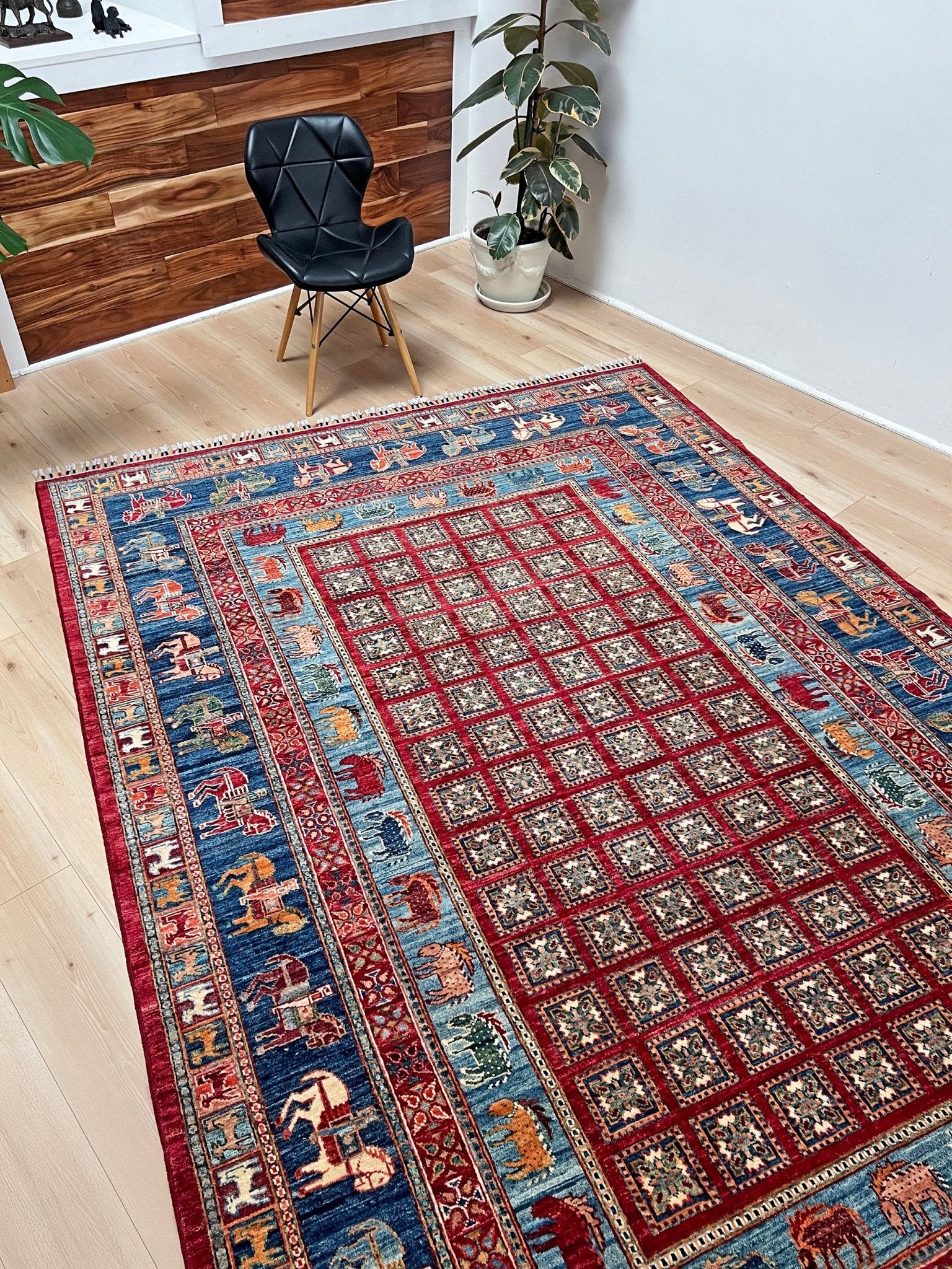 Luxury 6x9 handmade wool rug from Turkey, inspired by ancient Pazyryk motifs, featuring intricate grid patterns and stylized animals, perfect for living rooms, bedrooms, offices, and nurseries. Available at the Beds Rug Shop in the San Francisco Bay Area with free shipping.