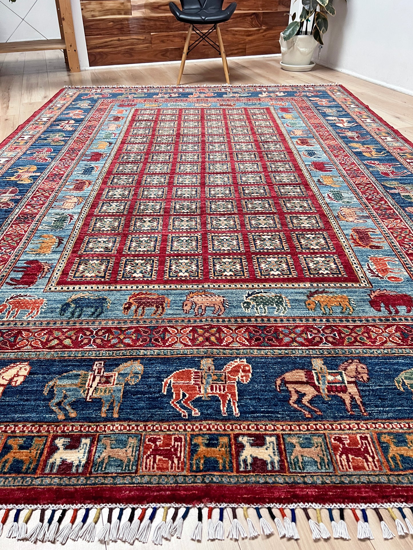 Luxury 6x9 handmade wool rug from Turkey, inspired by ancient Pazyryk motifs, featuring intricate grid patterns and stylized animals, perfect for living rooms, bedrooms, offices, and nurseries. Available at the Beds Rug Shop in the San Francisco Bay Area with free shipping.