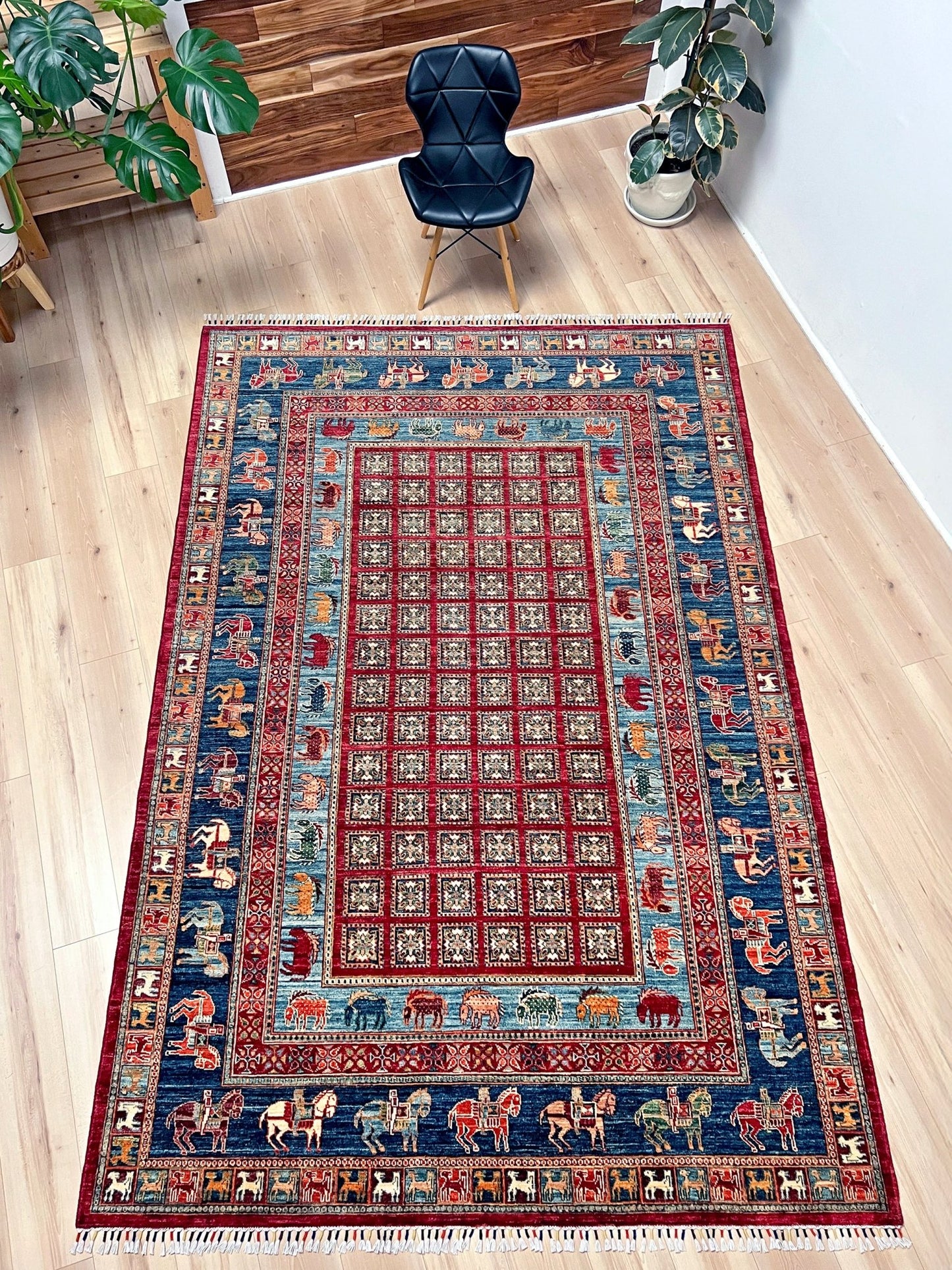 Luxury 6x9 handmade wool rug from Turkey, inspired by ancient Pazyryk motifs, featuring intricate grid patterns and stylized animals, perfect for living rooms, bedrooms, offices, and nurseries. Available at the Beds Rug Shop in the San Francisco Bay Area with free shipping.