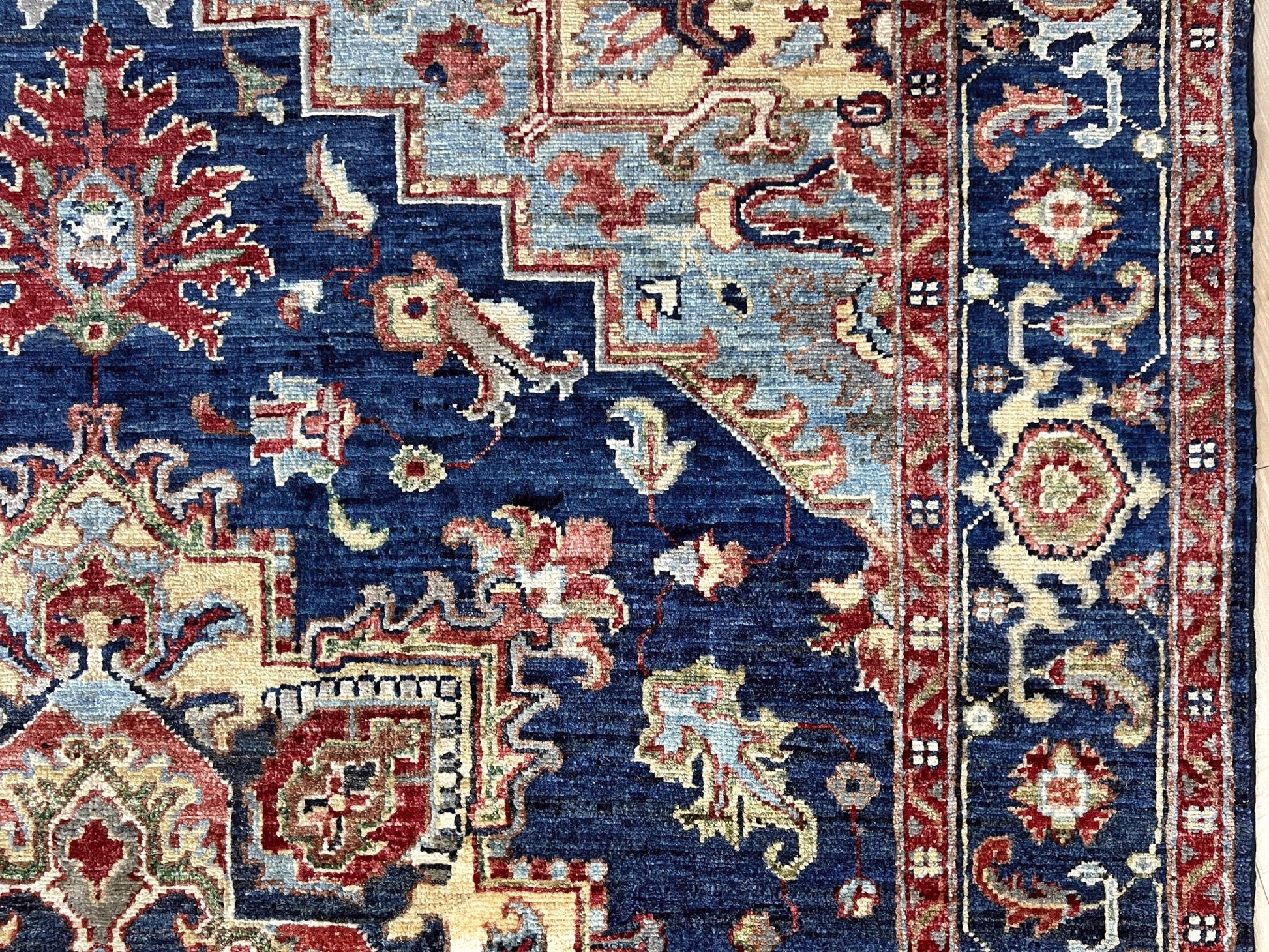 3x5 Heriz Persian handmade wool rug in deep indigo, red, and cream with a bold geometric medallion, from the best luxury handmade rug shop in the San Francisco Bay Area. Perfect scatter rug or accent rug for living room, bedroom, kitchen, or nursery. Free shipping