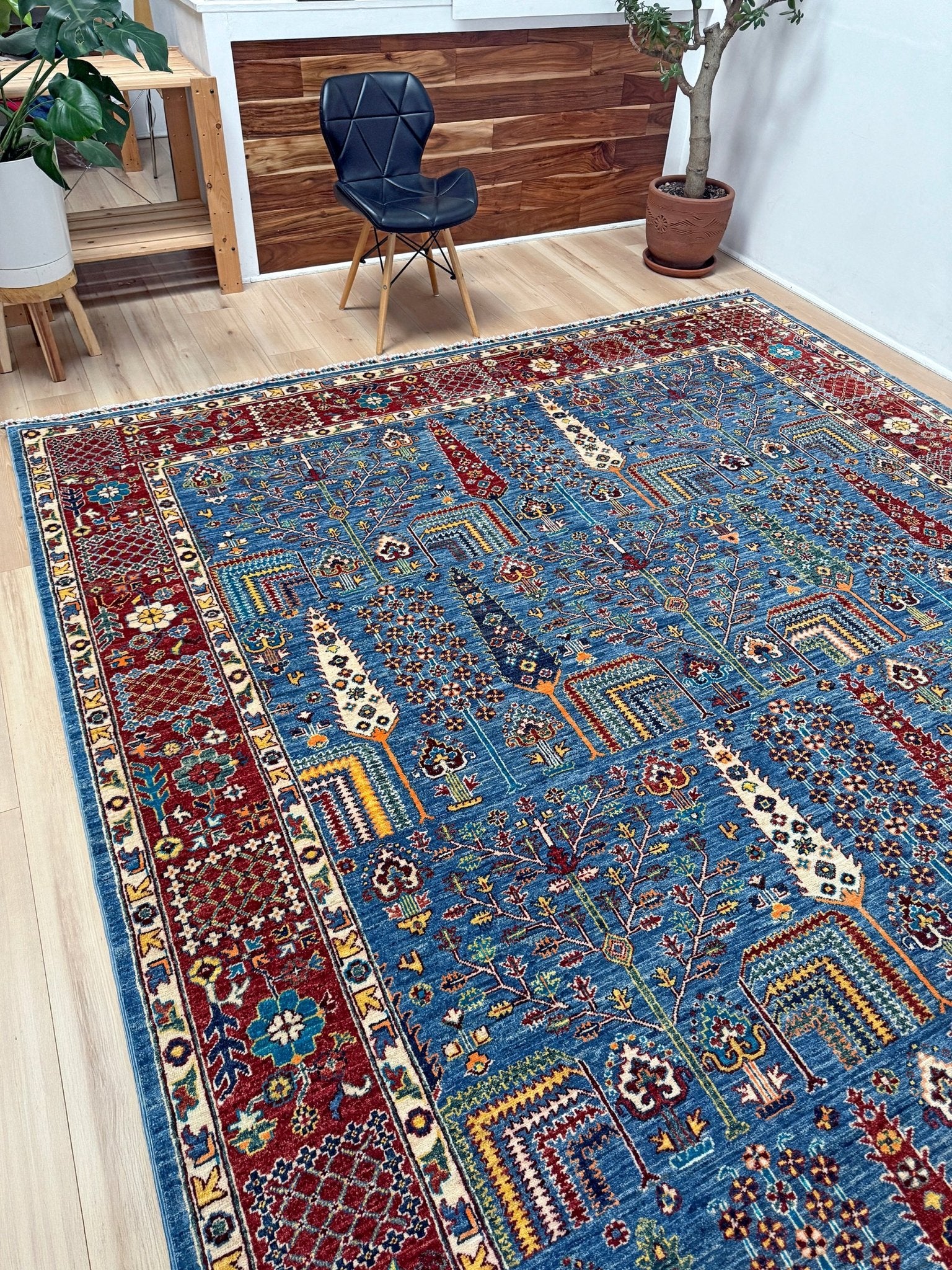 Brand new 9x12 Tree of Life Turkish rug – sky blue with deep crimson red, ivory, and gold accents. Perfect for bedroom, living room, or dining area. High-quality, handmade wool rug from the best rug shop in San Mateo, SF Bay Area. Free shipping available.