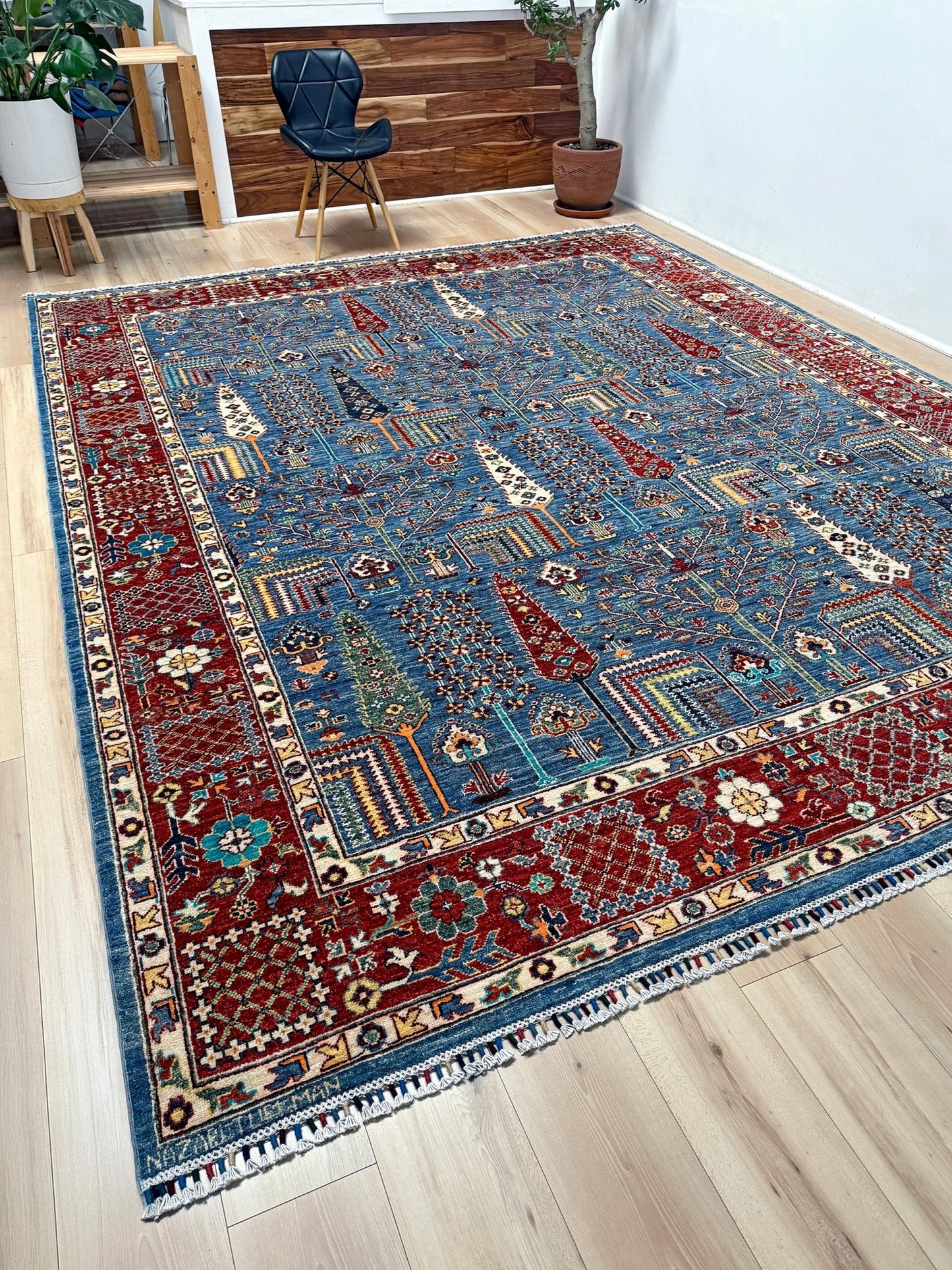 Brand new 9x12 Tree of Life Turkish rug – sky blue with deep crimson red, ivory, and gold accents. Perfect for bedroom, living room, or dining area. High-quality, handmade wool rug from the best rug shop in San Mateo, SF Bay Area. Free shipping available.