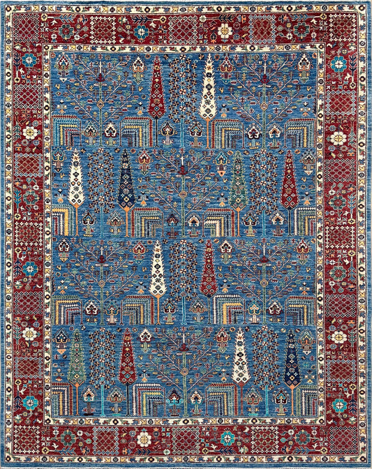 Brand new 9x12 Tree of Life Turkish rug – sky blue with deep crimson red, ivory, and gold accents. Perfect for bedroom, living room, or dining area. High-quality, handmade wool rug from the best rug shop in Burlingame CA, SF Bay Area. Free shipping available.