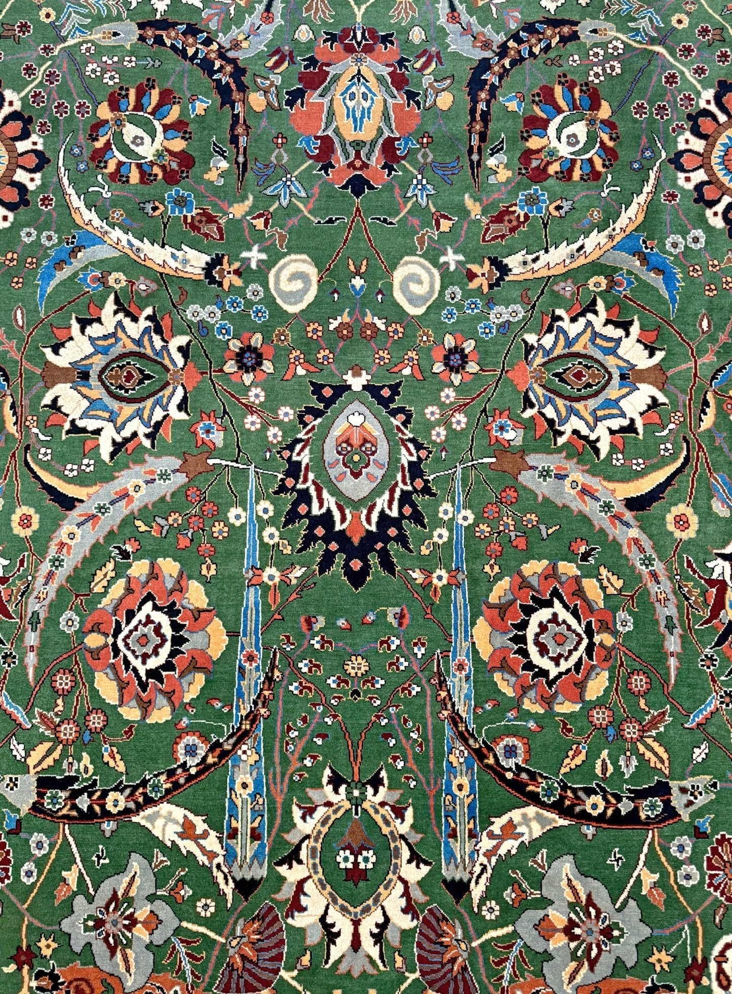 Brand new 9x12 Persian sickle leaf rug with verdant green, navy, and crimson hues, available at the best rug shop in San Mateo, SF Bay Area. Handwoven with intricate floral and vine patterns, perfect for a bedroom, living room, or dining space. High-quality wool rug with rich character and timeless elegance. Free shipping available.