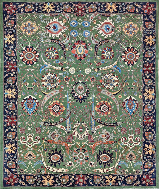 Brand new 9x12 Persian sickle leaf rug with verdant green, navy, and crimson hues, available at the best rug shop in San Mateo, SF Bay Area. Handwoven with intricate floral and vine patterns, perfect for a bedroom, living room, or dining space. High-quality wool rug with rich character and timeless elegance. Free shipping available.