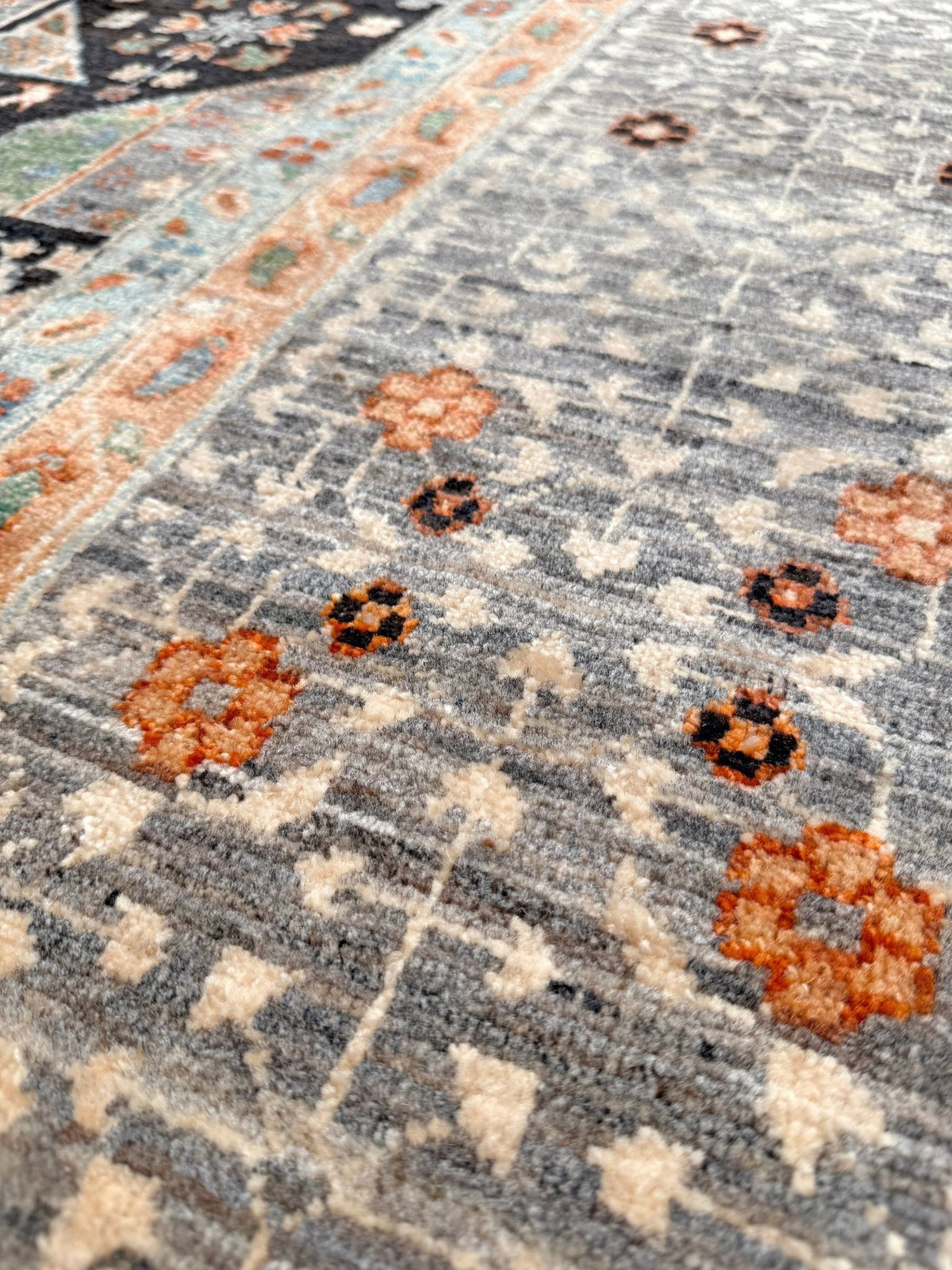 10x14 Charcoal and peach Sultanate Mamluk rug with large central medallion, geometric floral motifs, handmade Turkish wool from Indigo Rugs Burlingame, SF Bay Area.