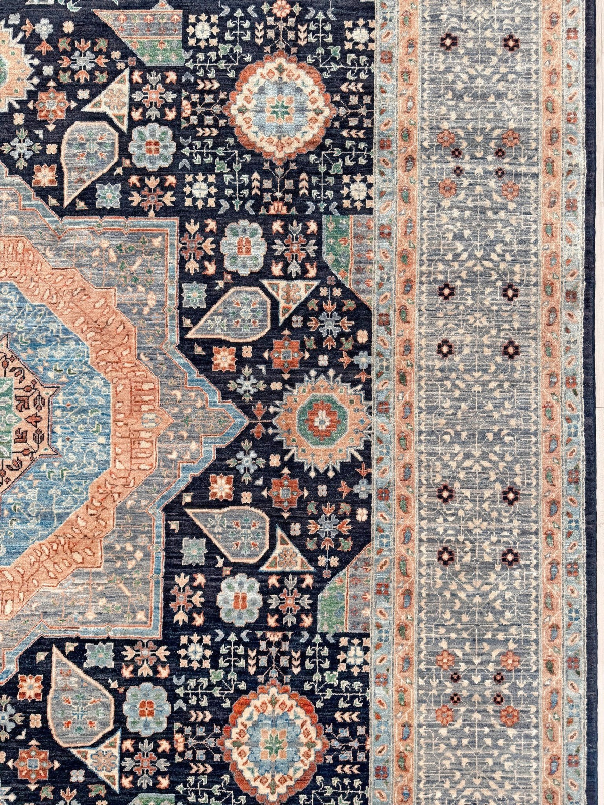 10x14 Charcoal and peach Sultanate Mamluk rug with large central medallion, geometric floral motifs, handmade Turkish wool from Indigo Rugs Burlingame, SF Bay Area.