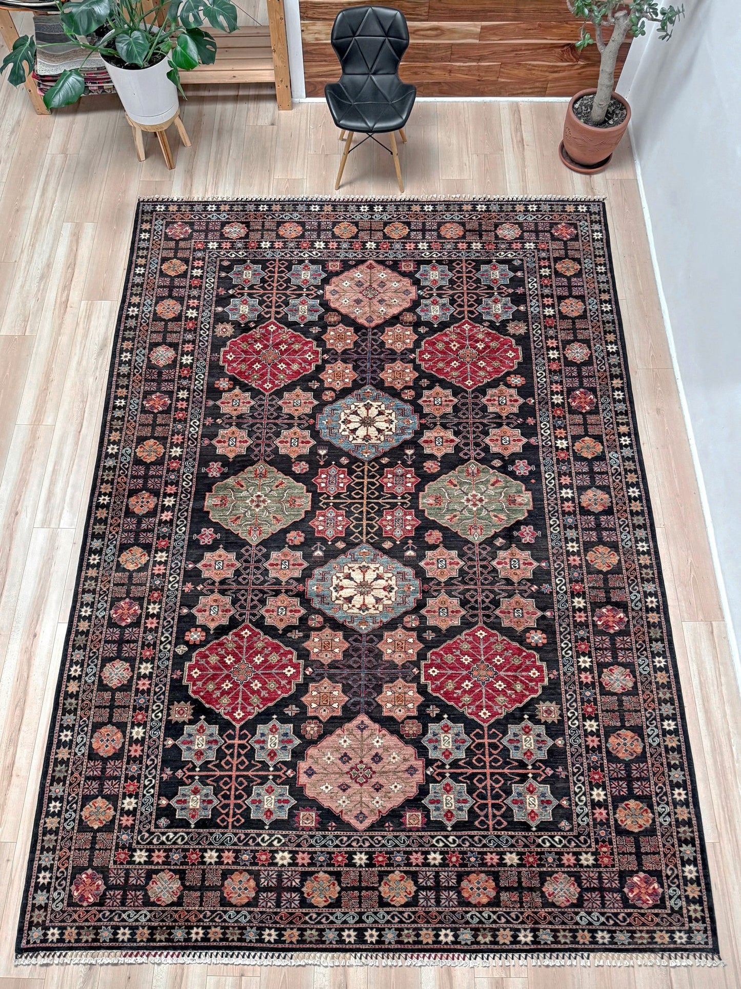 Charcoal Gendje Turkish rug with colorful allover floral medallions, crimson red, sage green, handmade wool 9x12 rug for living room, bedroom from Indigo Rugs Burlingame Bay Area.