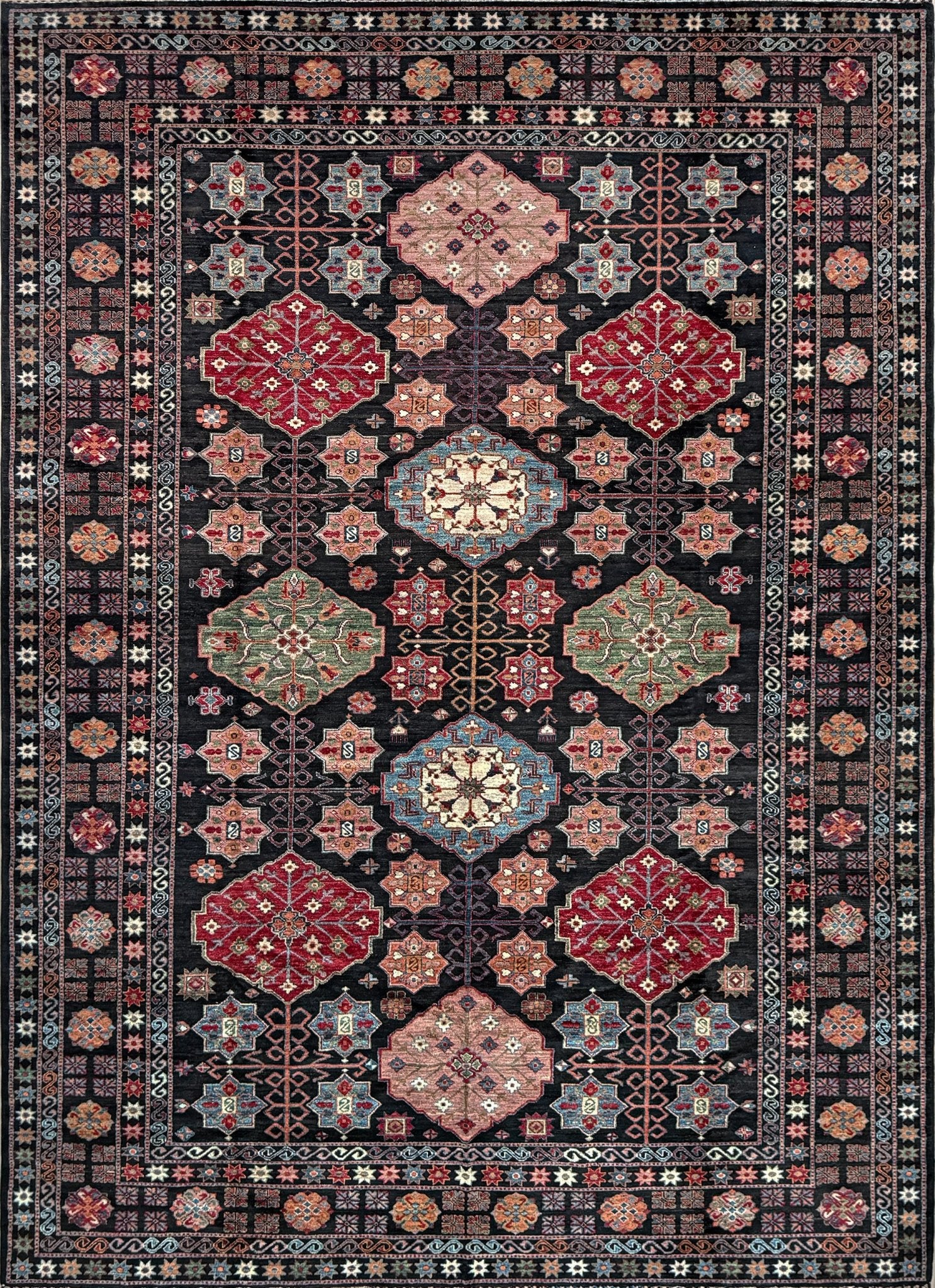 Handmade Turkmen-style 9x12 wool rug with Caucasian-inspired design, rich black, crimson, ivory, and sage hues. Luxury area rug with intricate medallions and floral motifs, perfect for bedroom, living room, or dining room. High-quality craftsmanship from the best rug shop in Burlingame CA, SF Bay Area. Free shipping, timeless character, and elegance for any space.